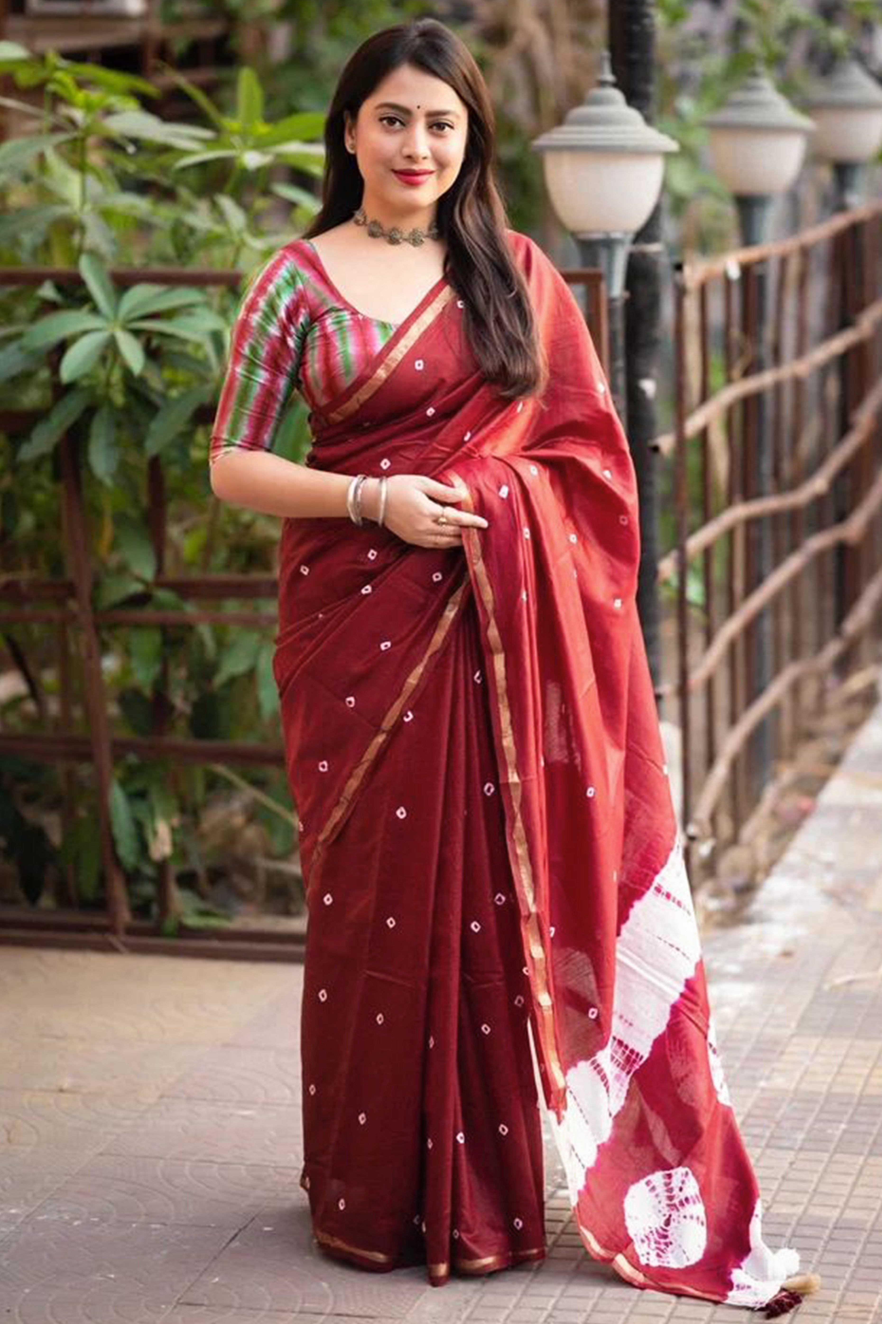 Maroon Linen Cotton Saree Adorned with Vibrant Bandhani Prints and Breezy Texture