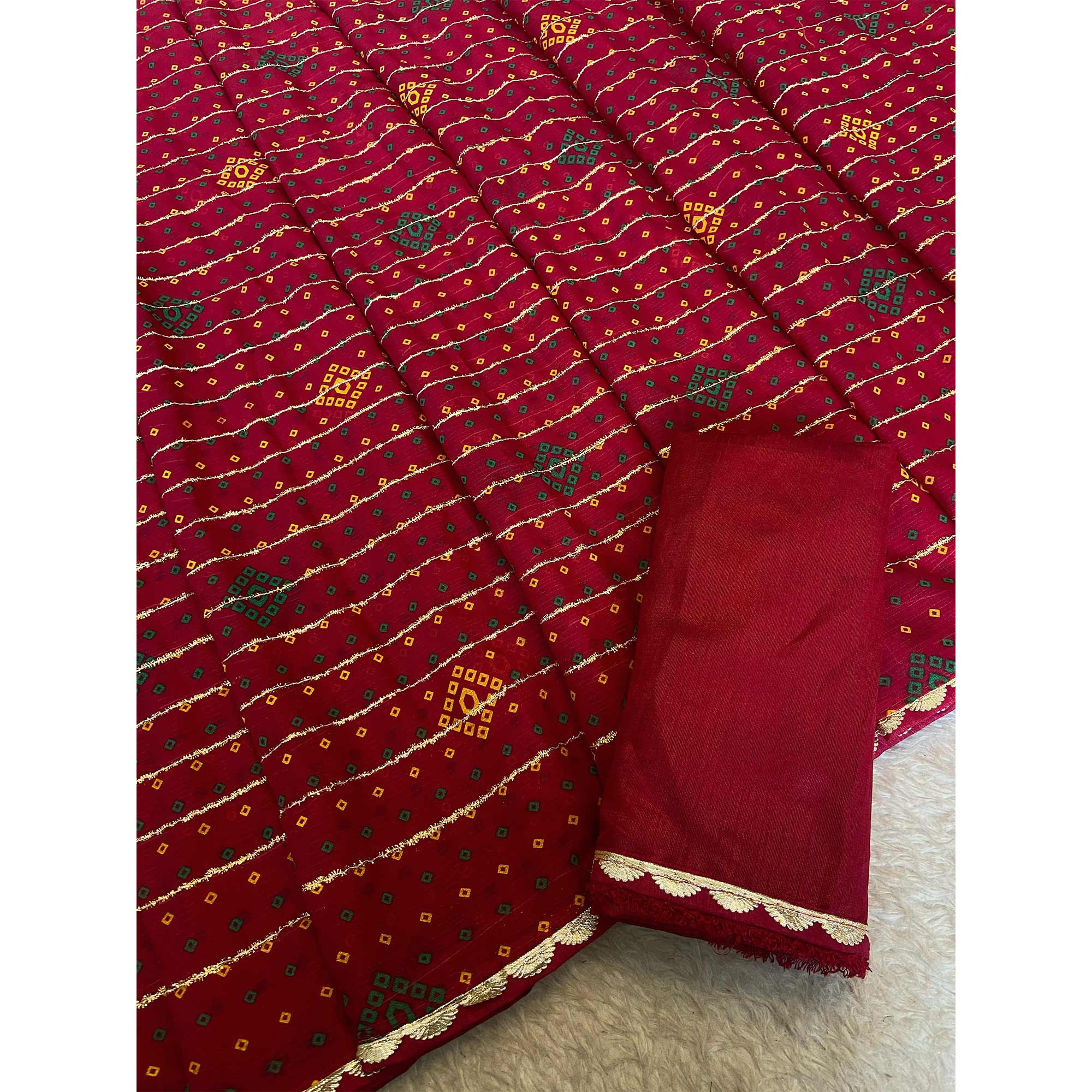 Pink Bandhani Printed Chiffon Saree with Graceful Touches of Zari Work