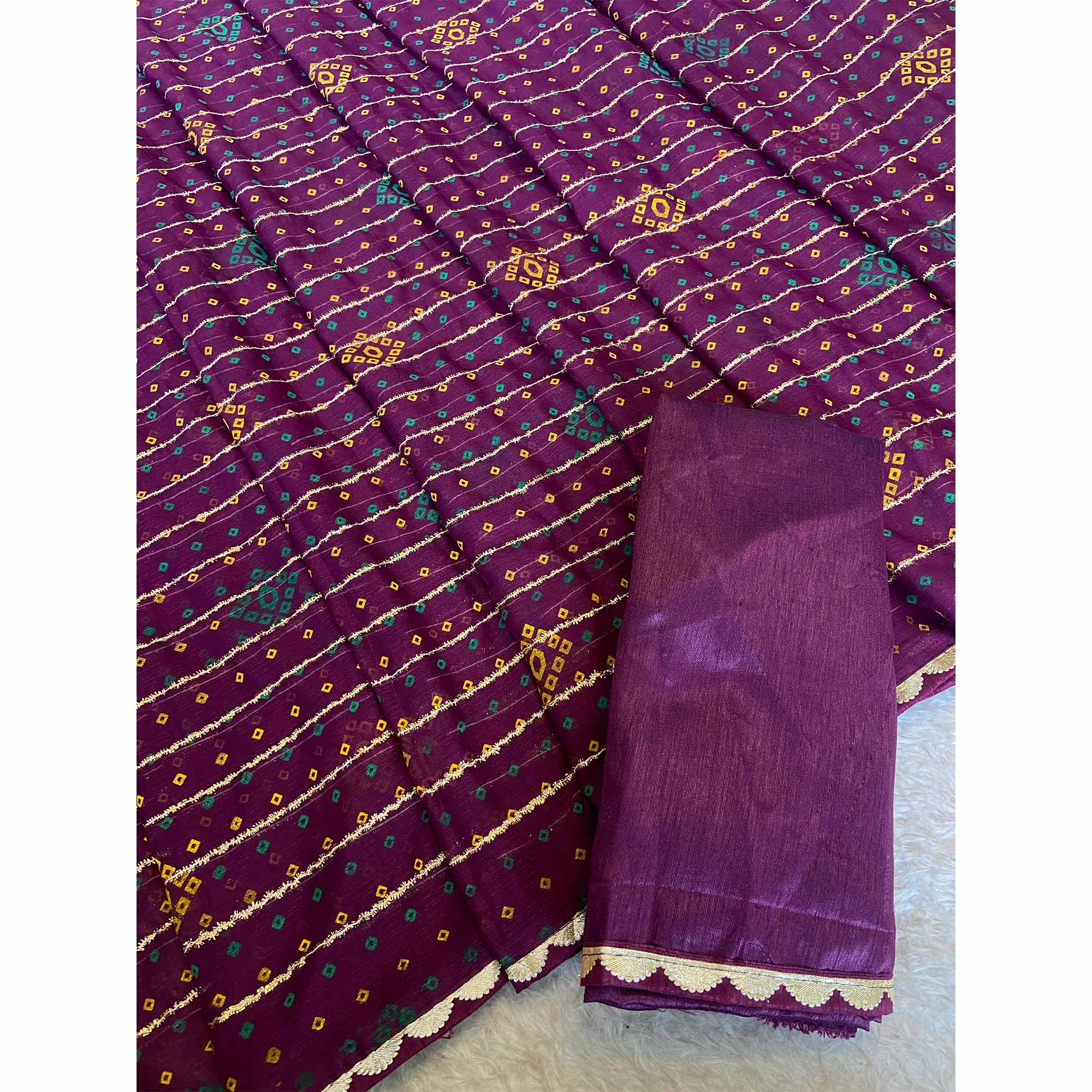 Purple Bandhani Printed Chiffon Saree with Graceful Touches of Zari Work
