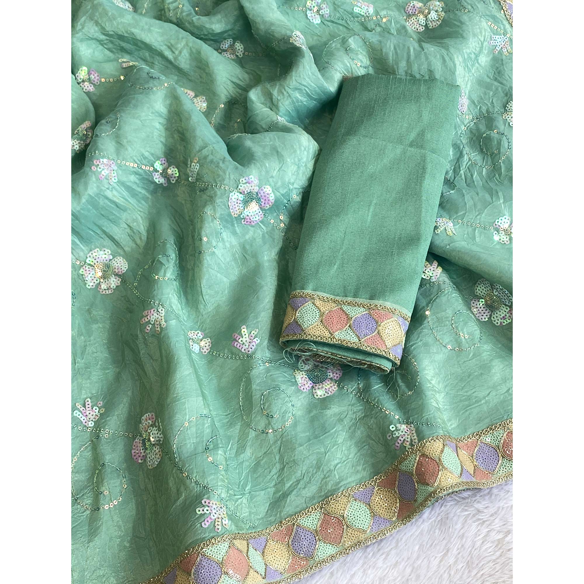 Sea Green Lightweight Tissue Saree with Subtle Yet Elegant Sequins Work