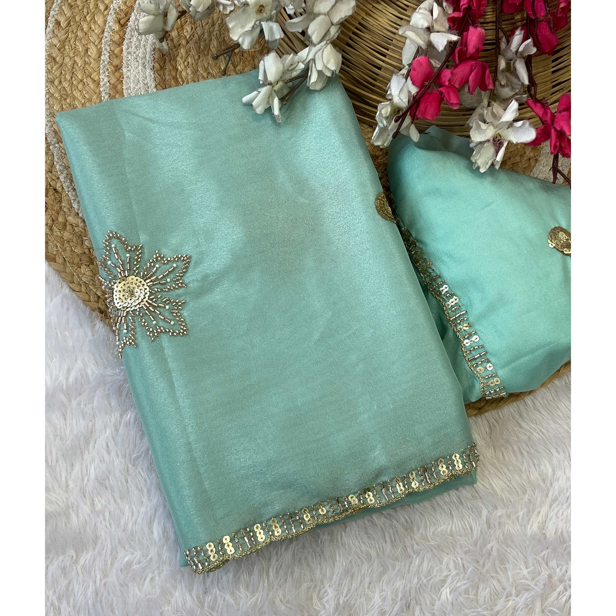 Turquoise Partywear Saree in Crepe with Intricate Stone Work