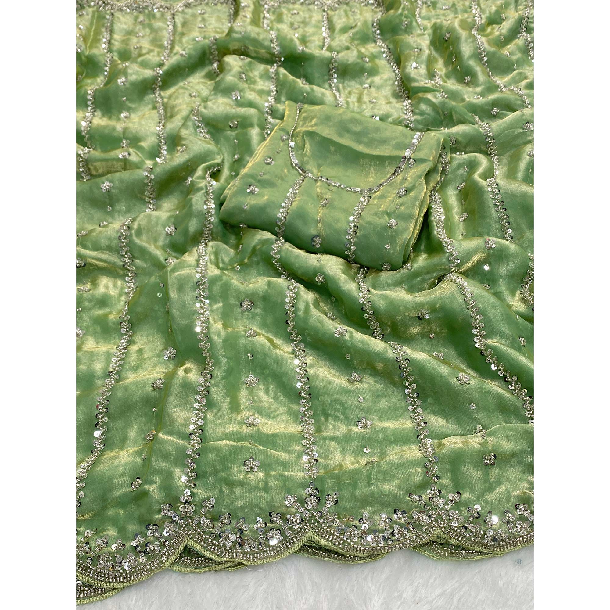 Green Designer Satin Partywear Saree Enhanced with Sparkling Sequins Work