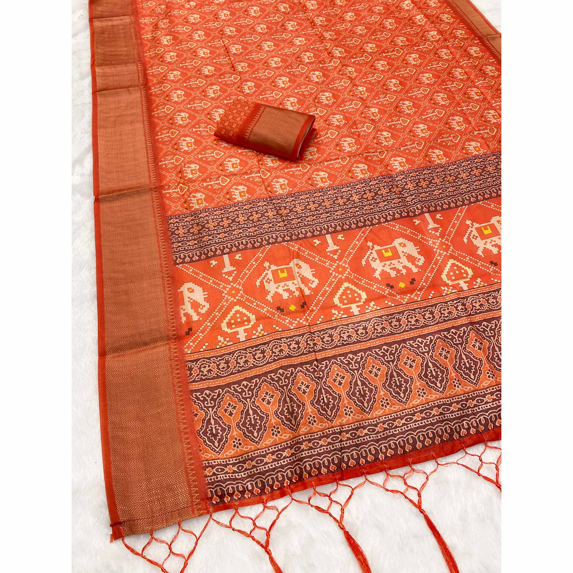 Orange Dola Silk Saree Featuring Traditional Patan Patola Print