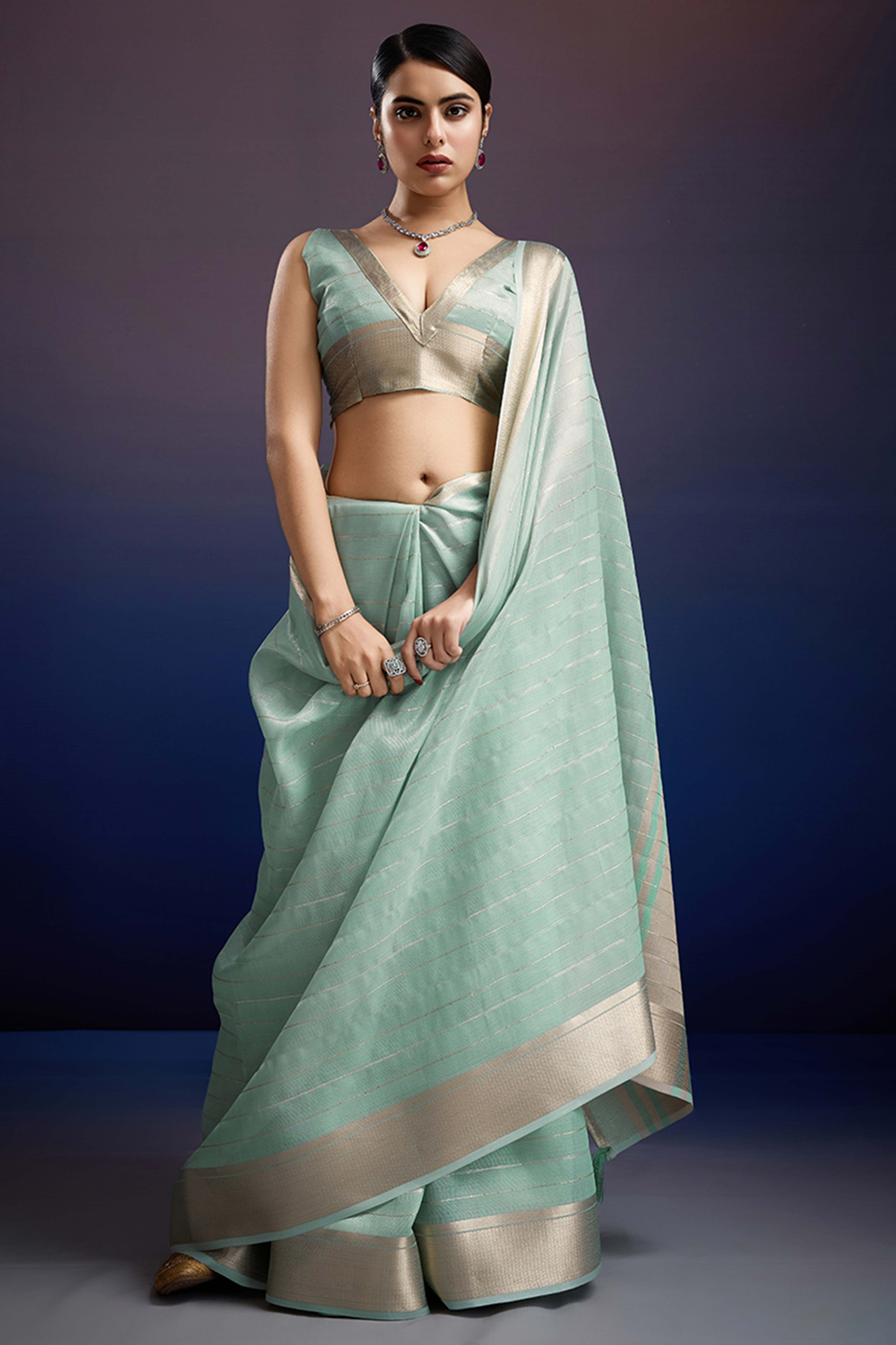 Mint Green Pure Linen Saree with Gold Toned Zari Weave