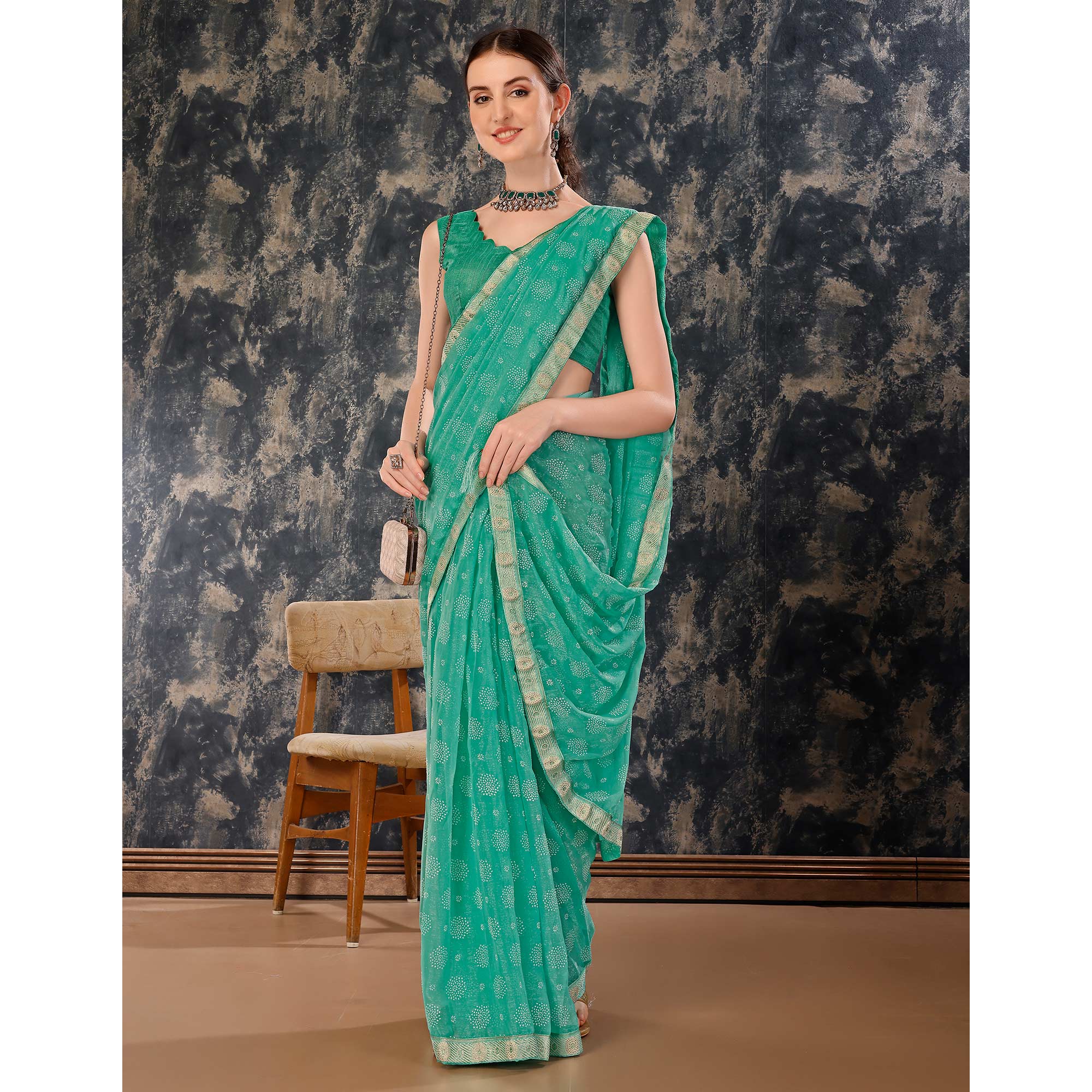 Turquoise Printed Chiffon Saree With Lace Border