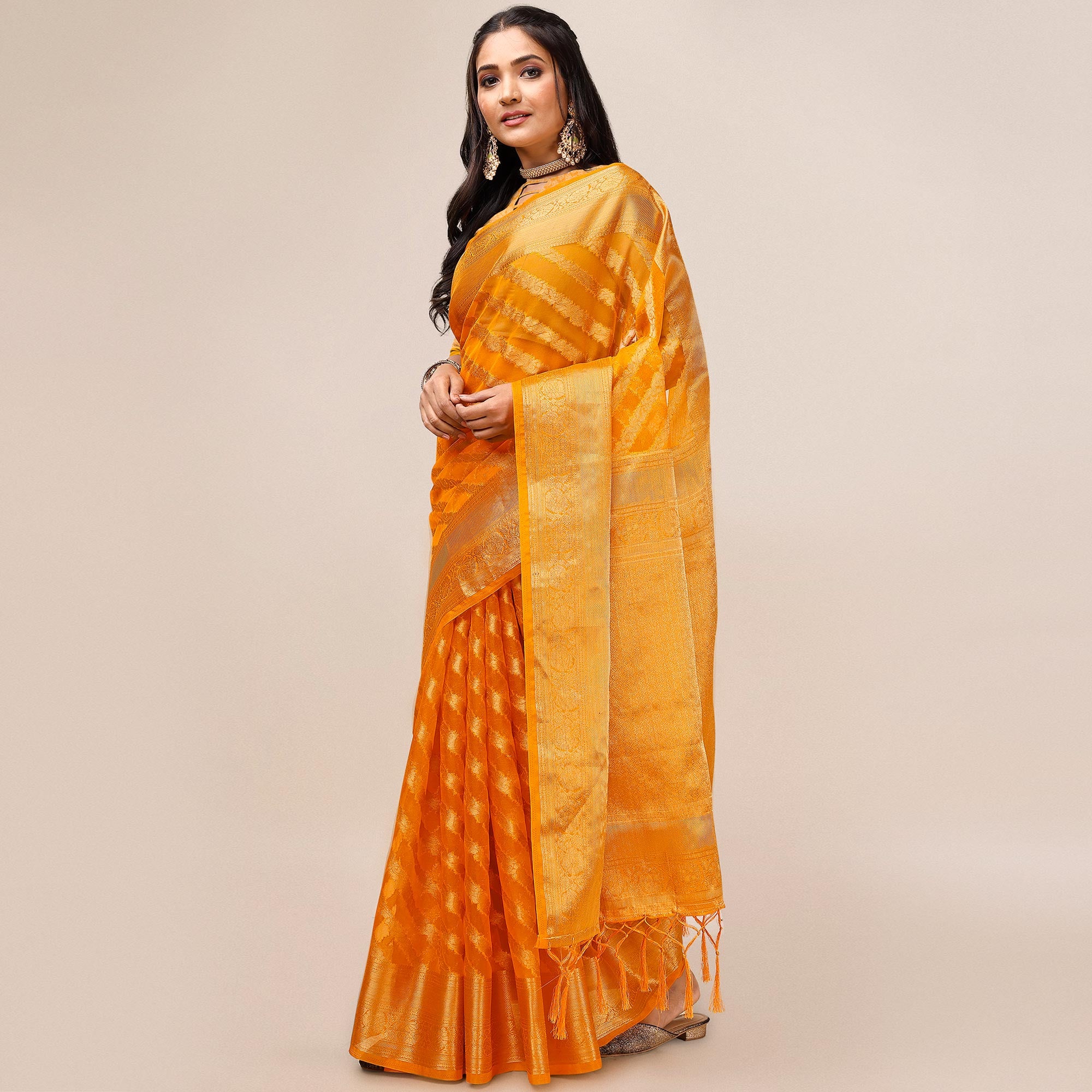 Orange Woven Organza Saree With Tassels