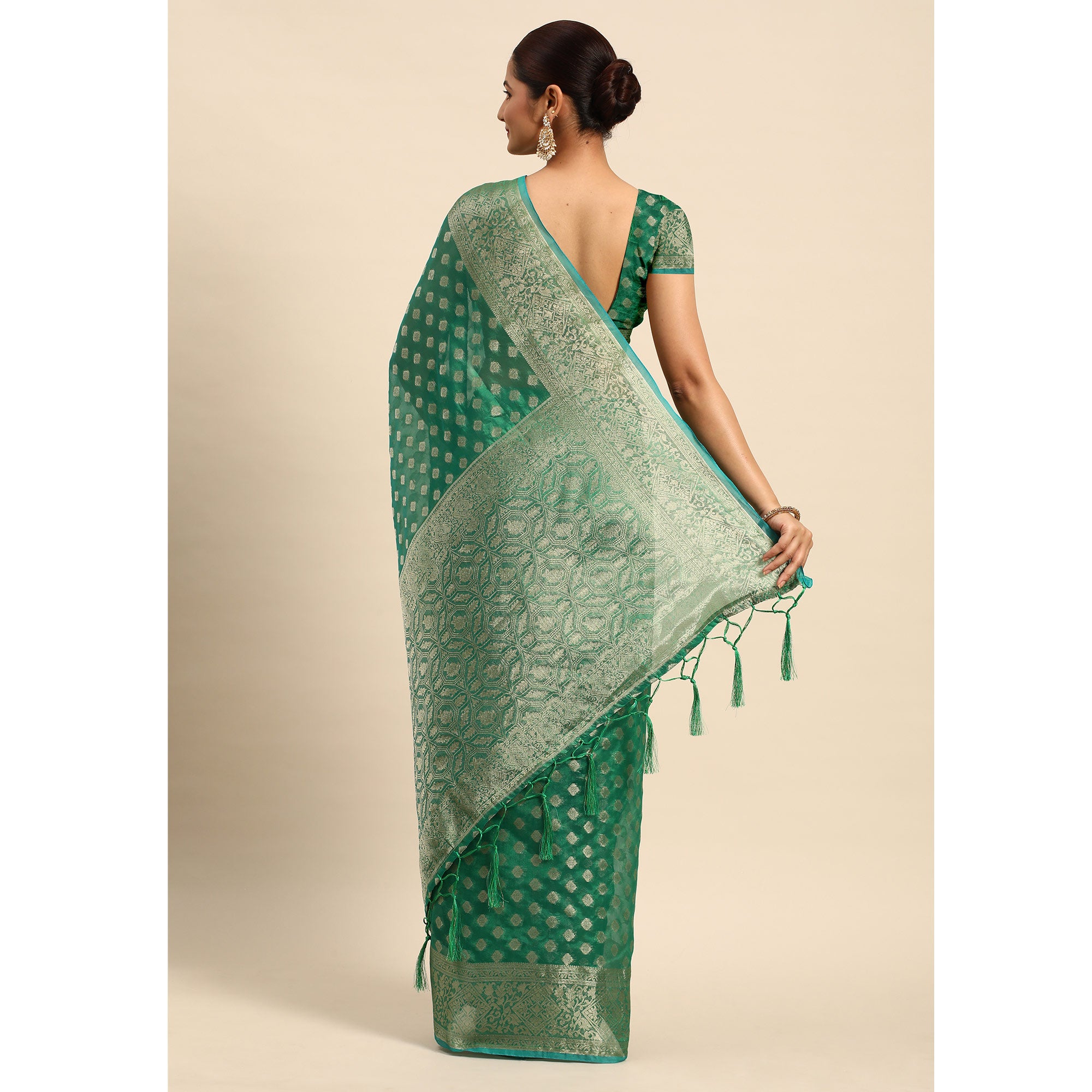 Green Woven Organza Silk Saree With Tassels