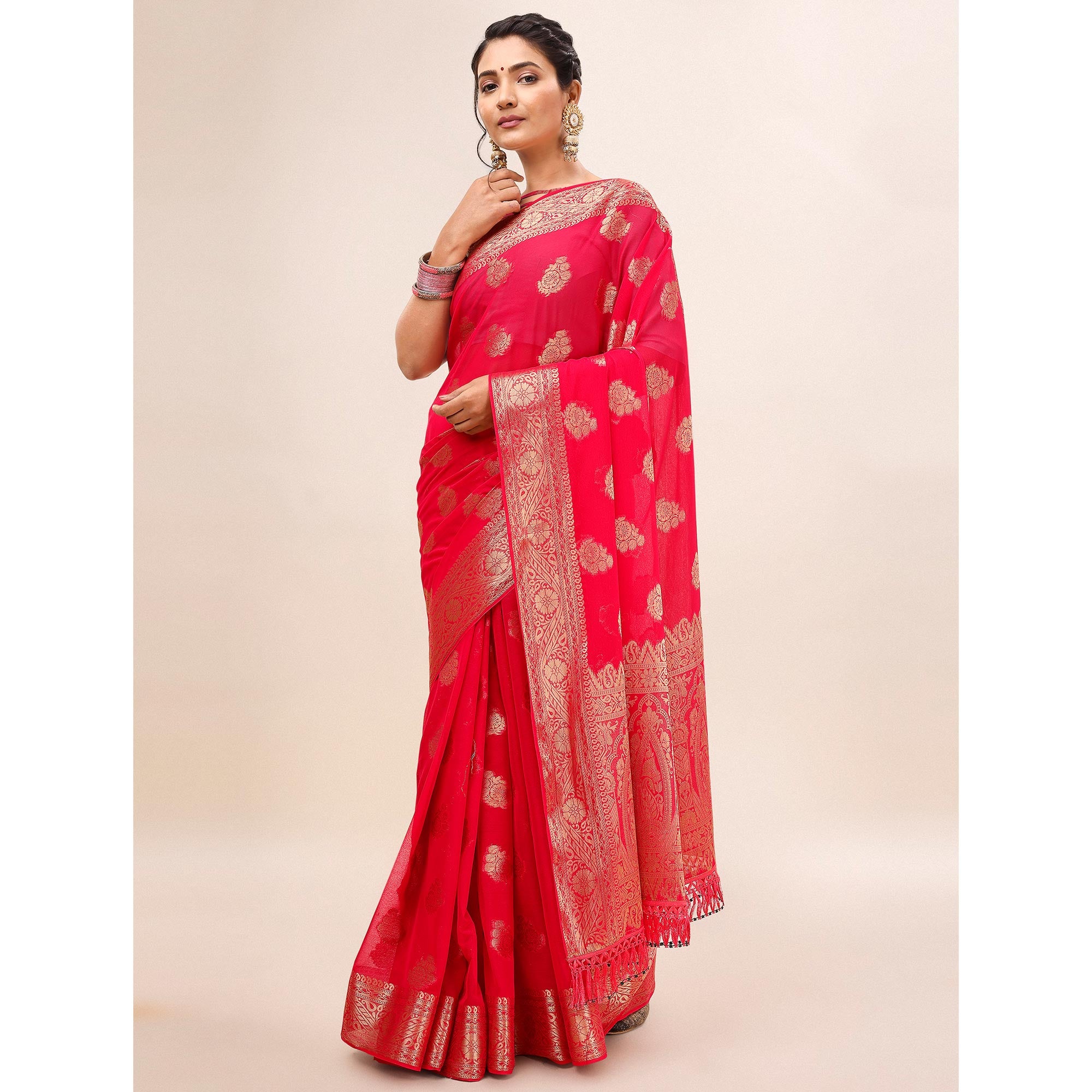 Pink Woven Chiffon Saree With Tassels