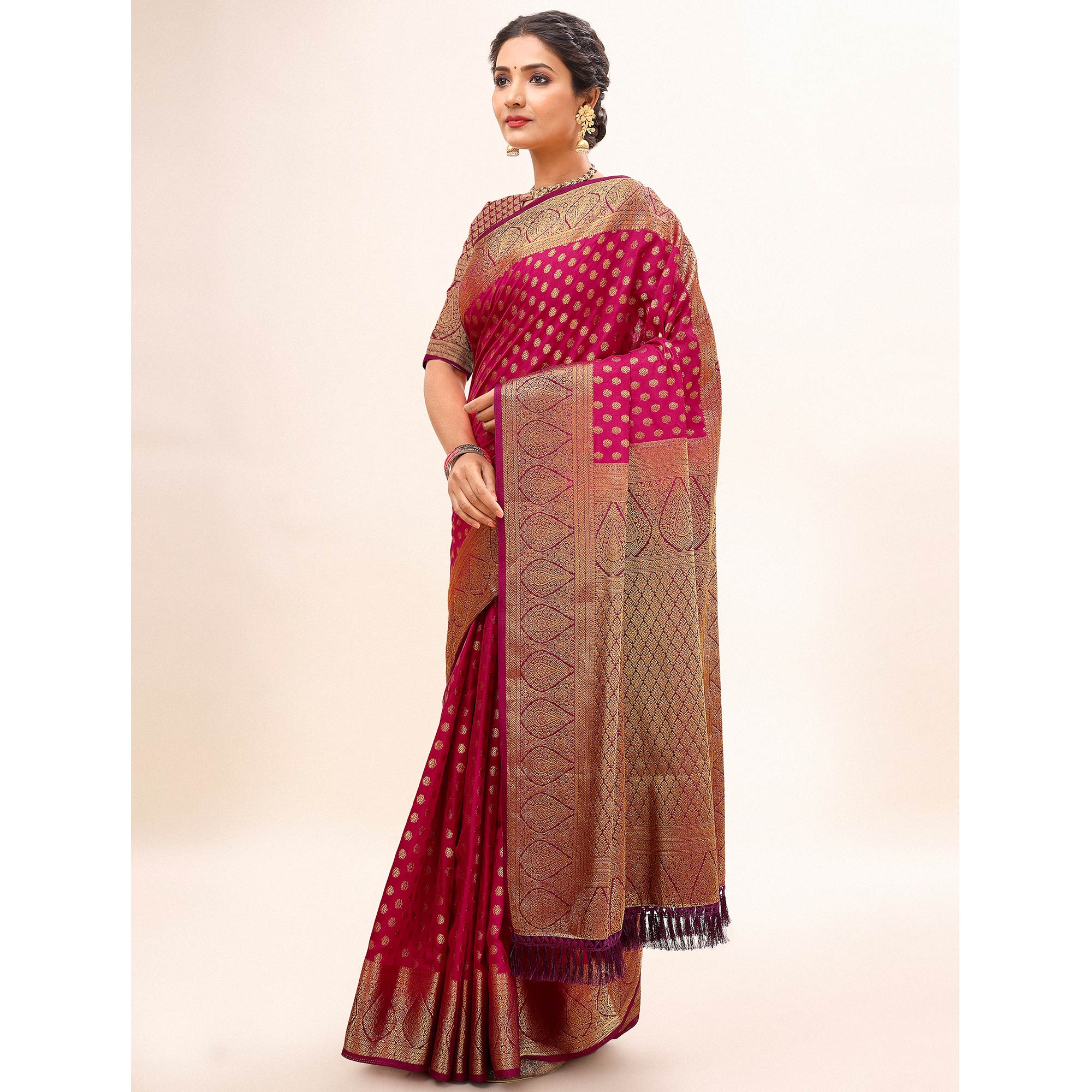 Rani Pink Woven Dola Silk Saree With Tassels