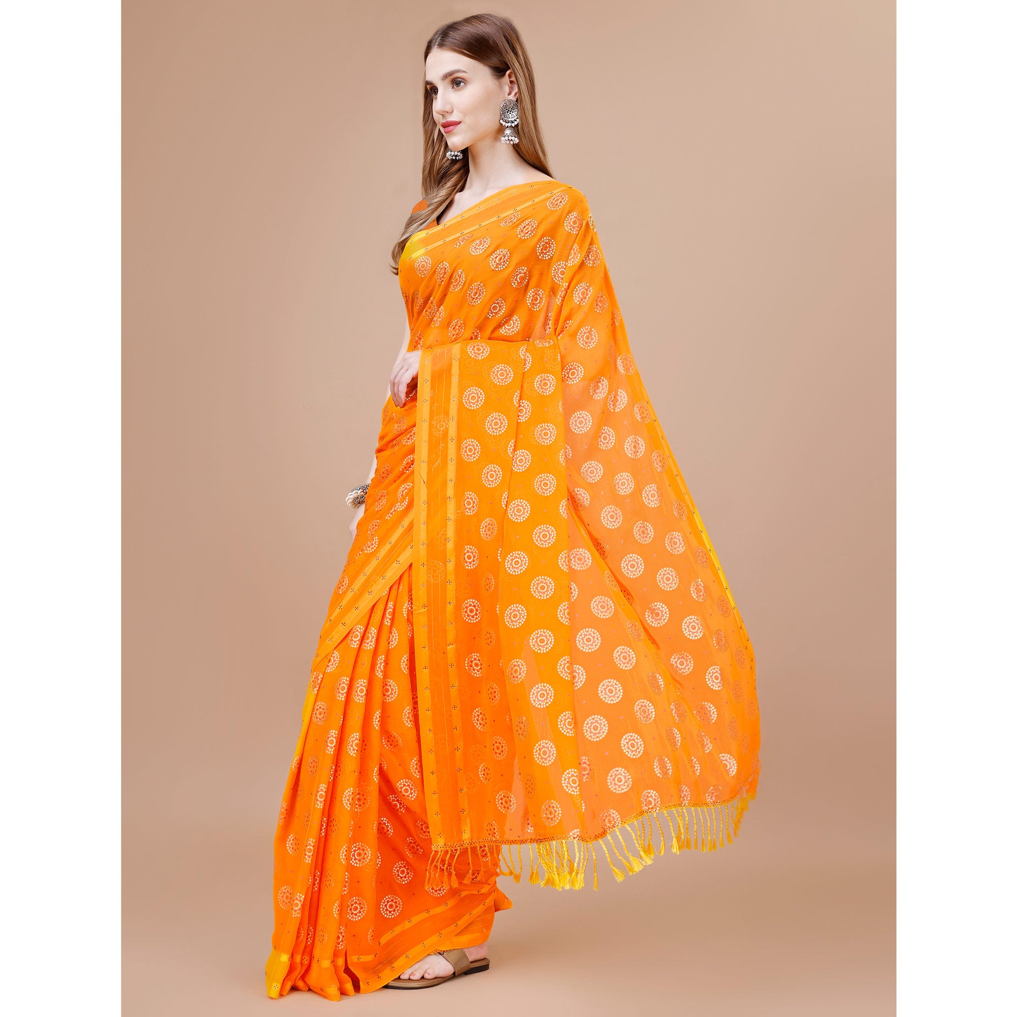 Orange Foil Printed Chiffon Saree With Tassels
