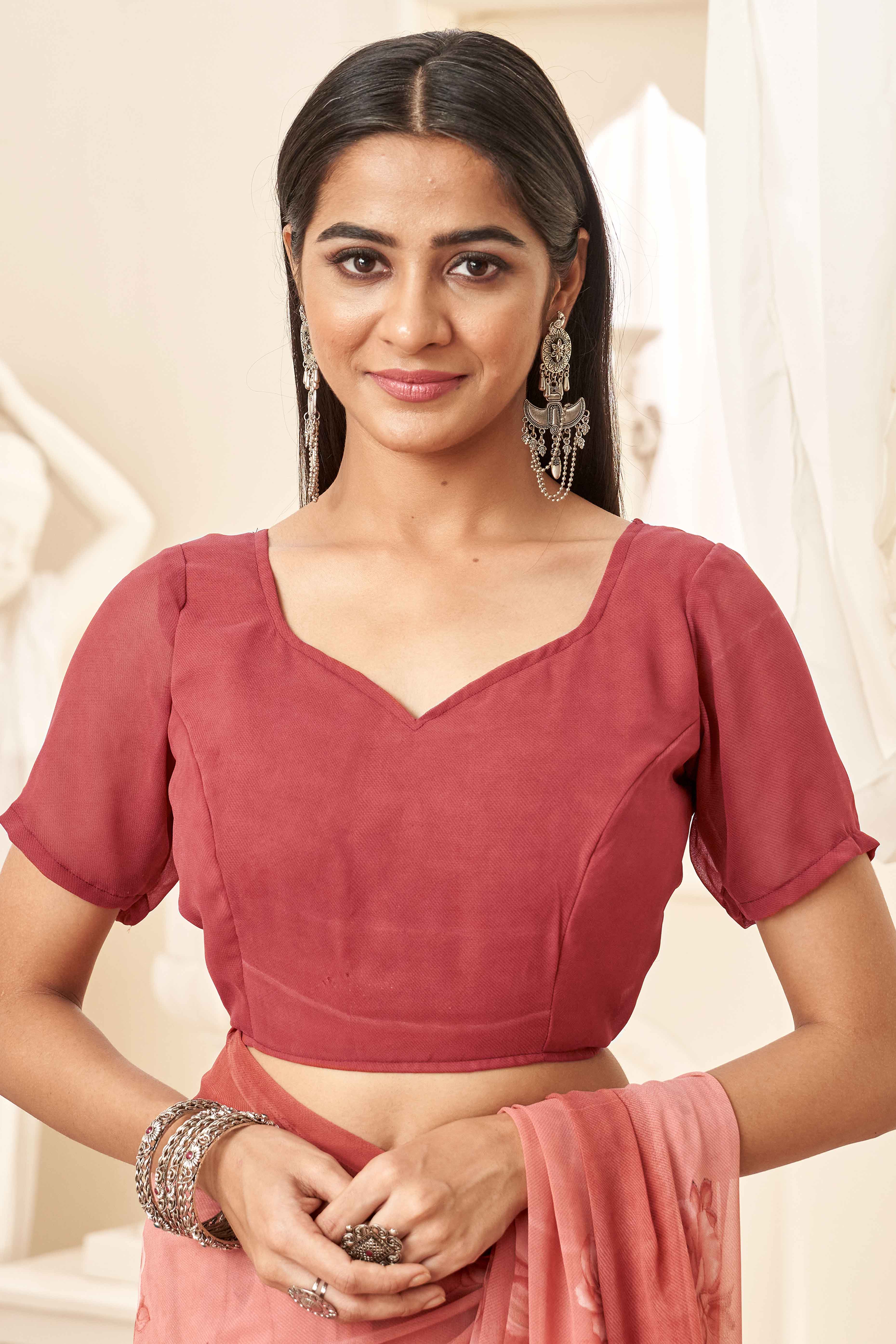 Coral Pink Georgette Saree With Delicate Floral Print