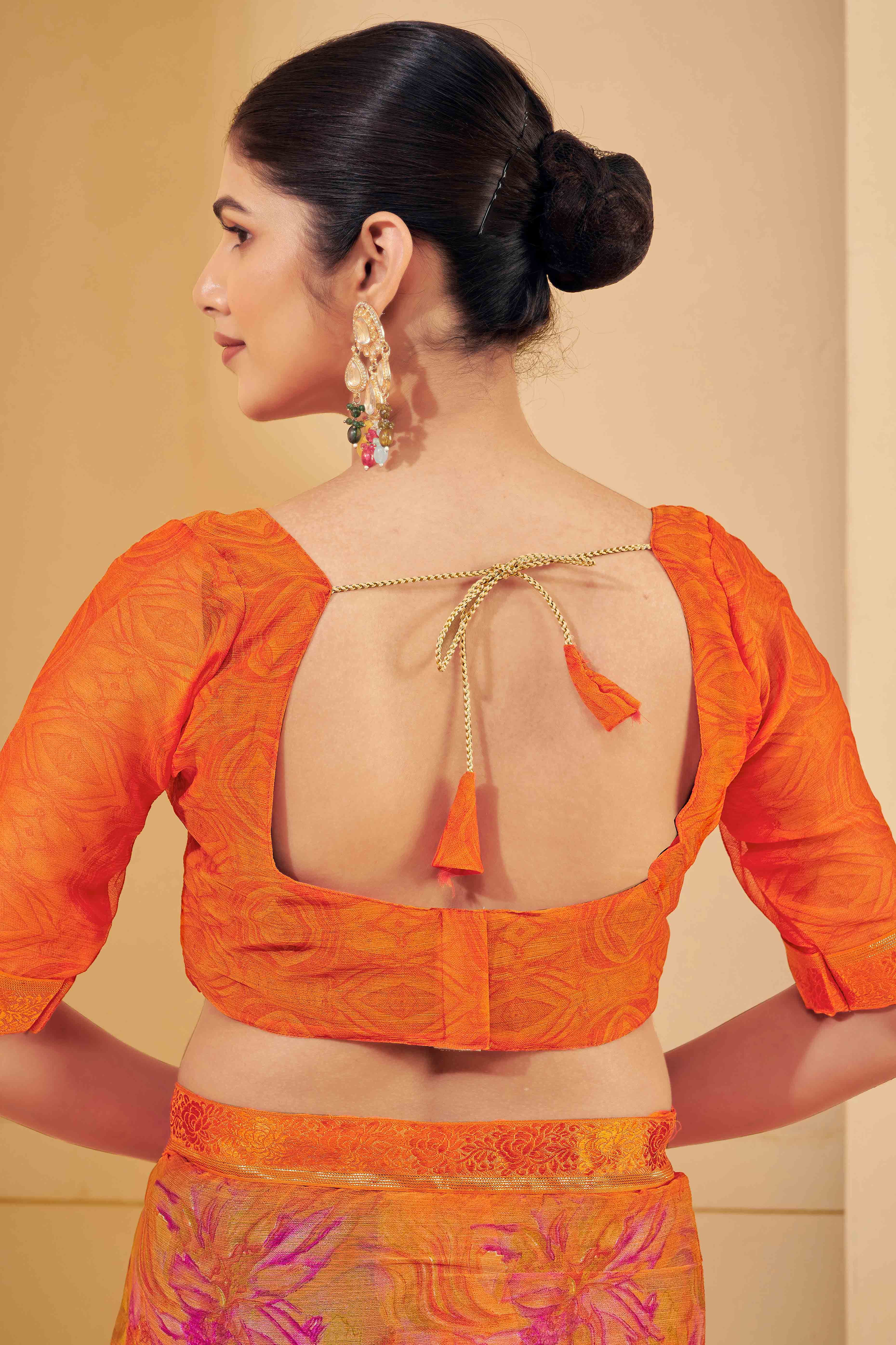 Orange Chiffon Saree Adorned With Artistic Floral Print & Finely Crafted Woven Lace Border