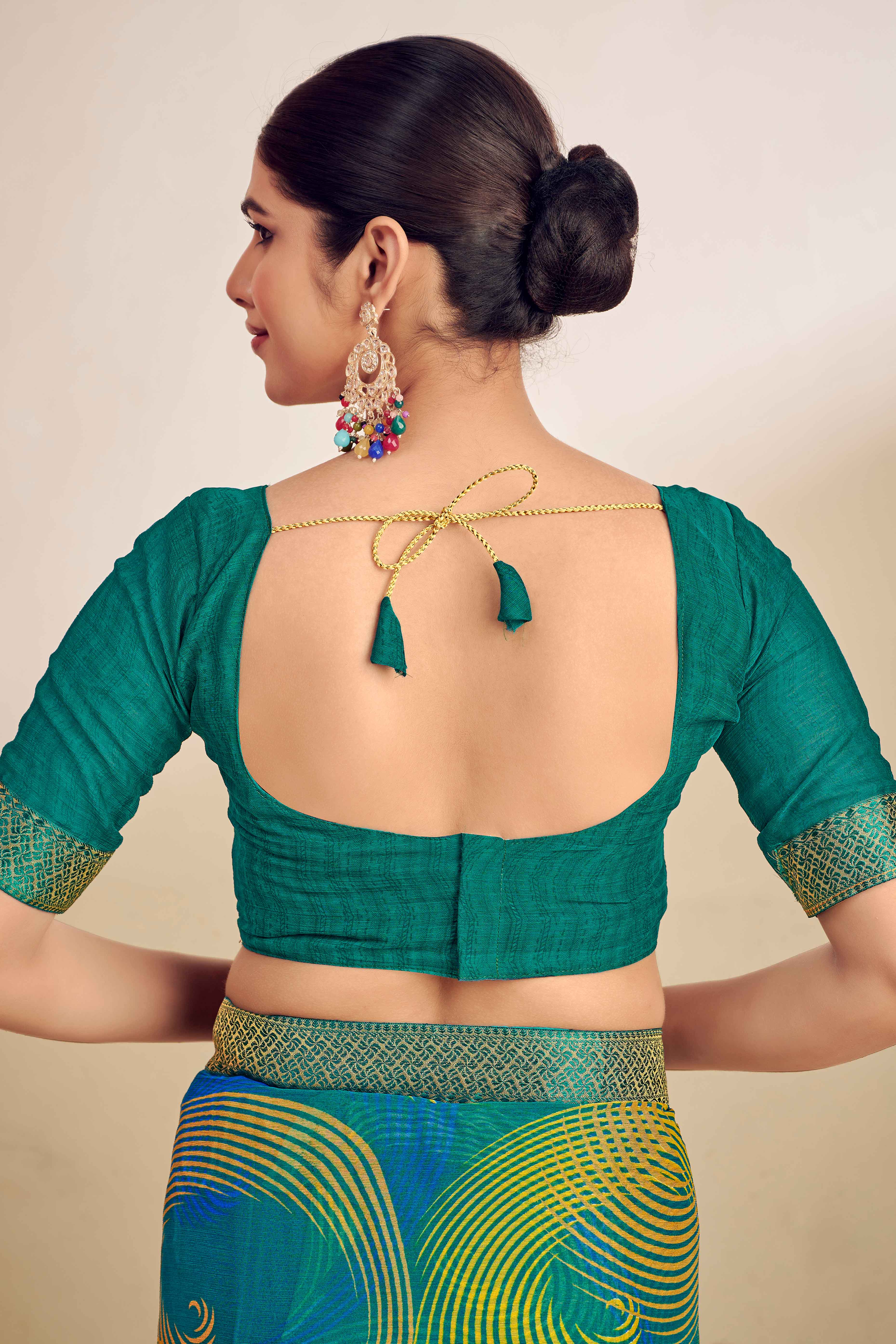 Teal Green Chiffon Saree Adorned With Artistic Print & Finely Crafted Woven Lace Border