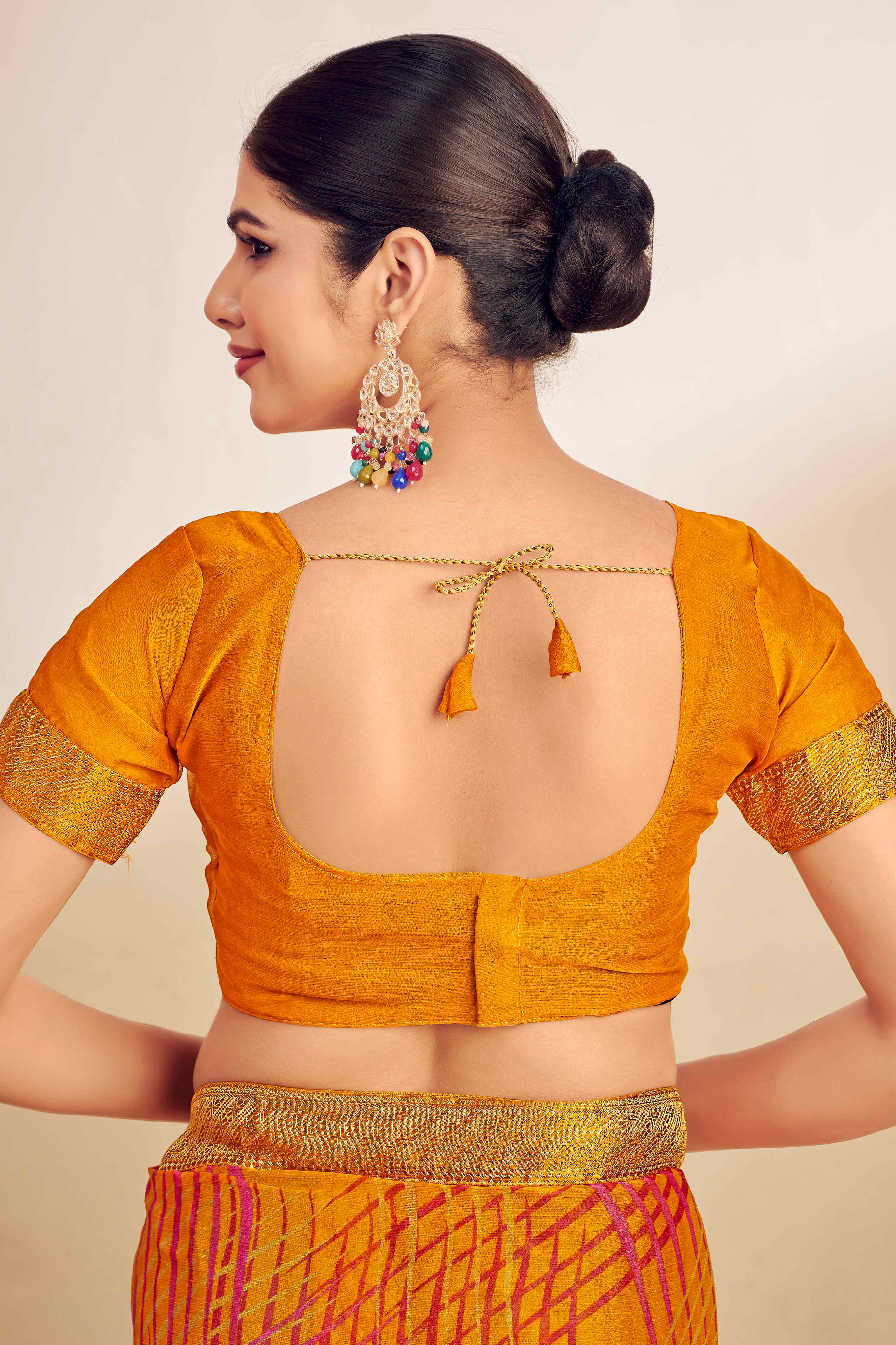 Mustard Chiffon Saree Adorned With Artistic Print & Finely Crafted Woven Lace Border