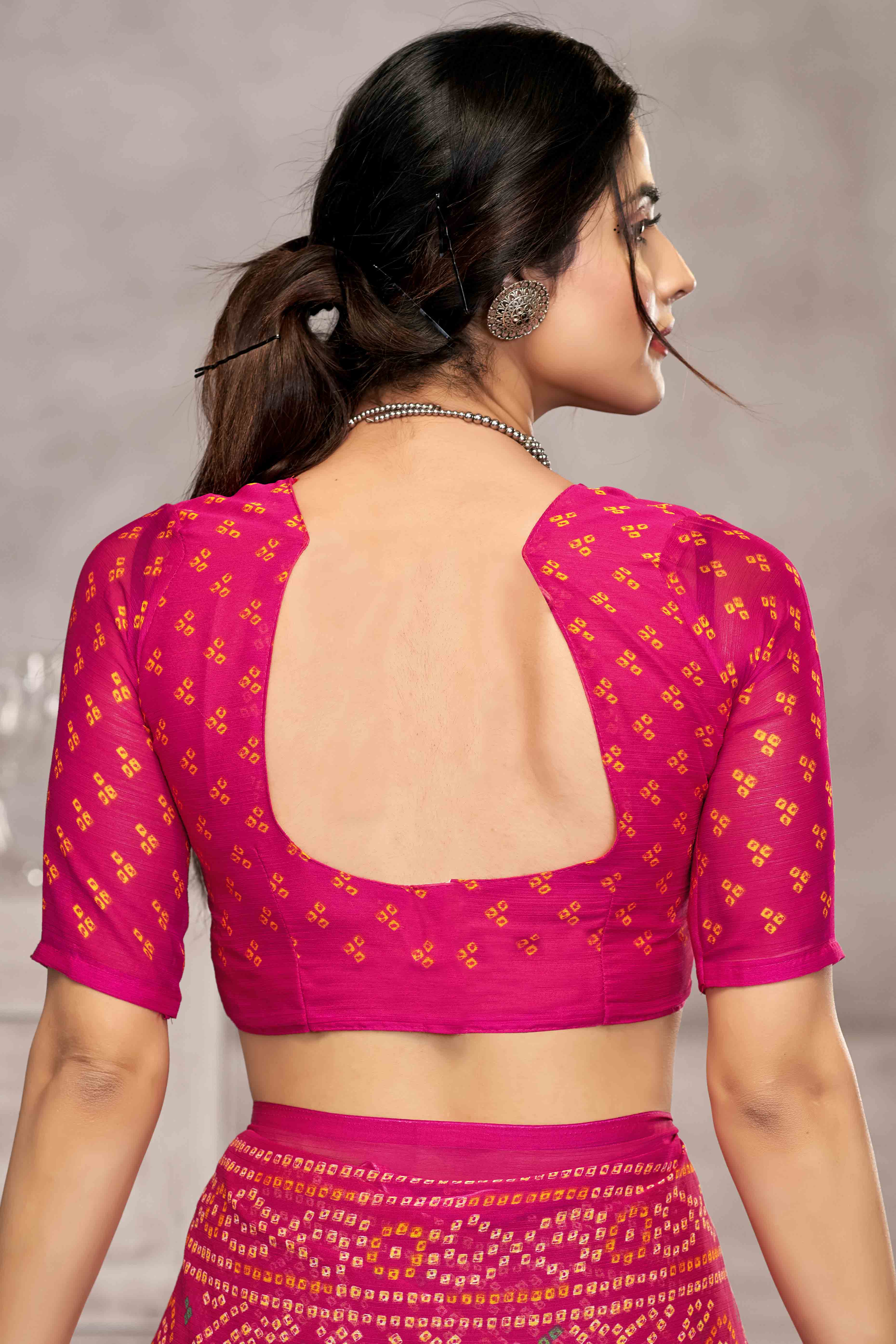 Magenta Chiffon Saree Features Bandhani Print for Casual Occasion