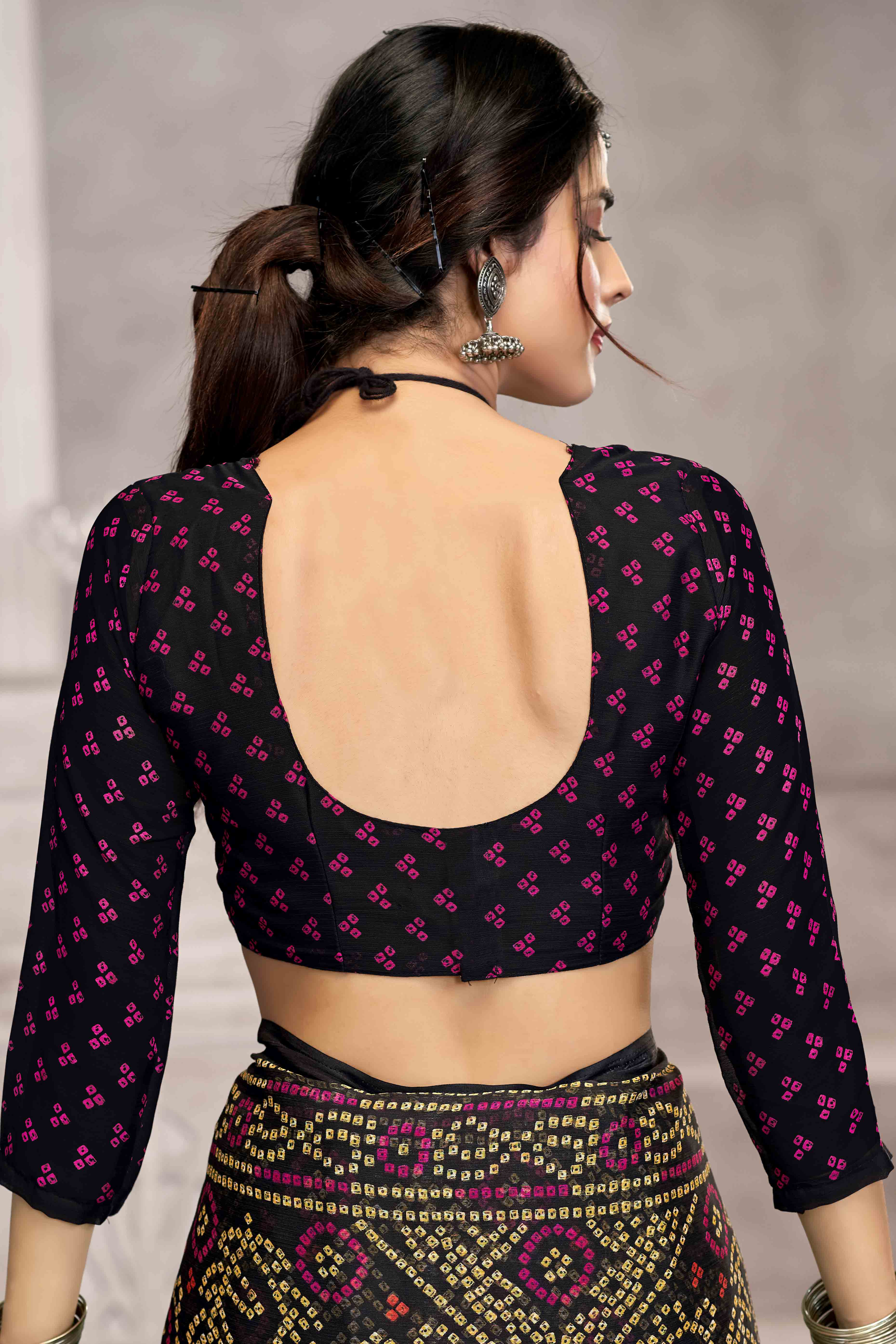 Black Chiffon Saree Features Bandhani Print for Casual Occasion