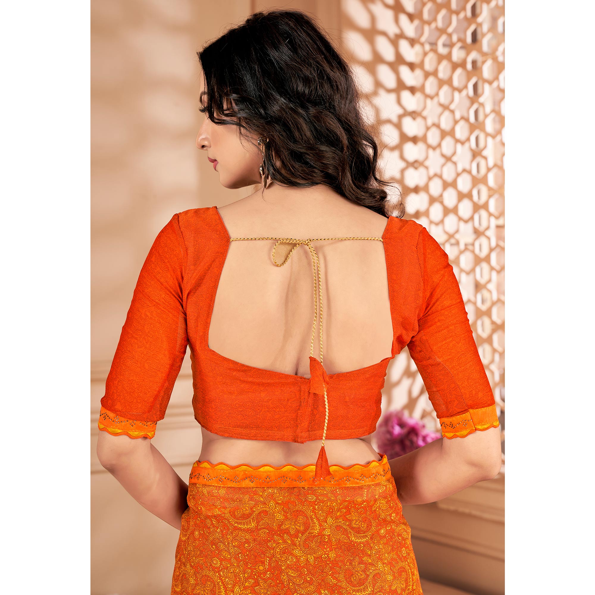 Orange Printed Chiffon Saree With Lace Border
