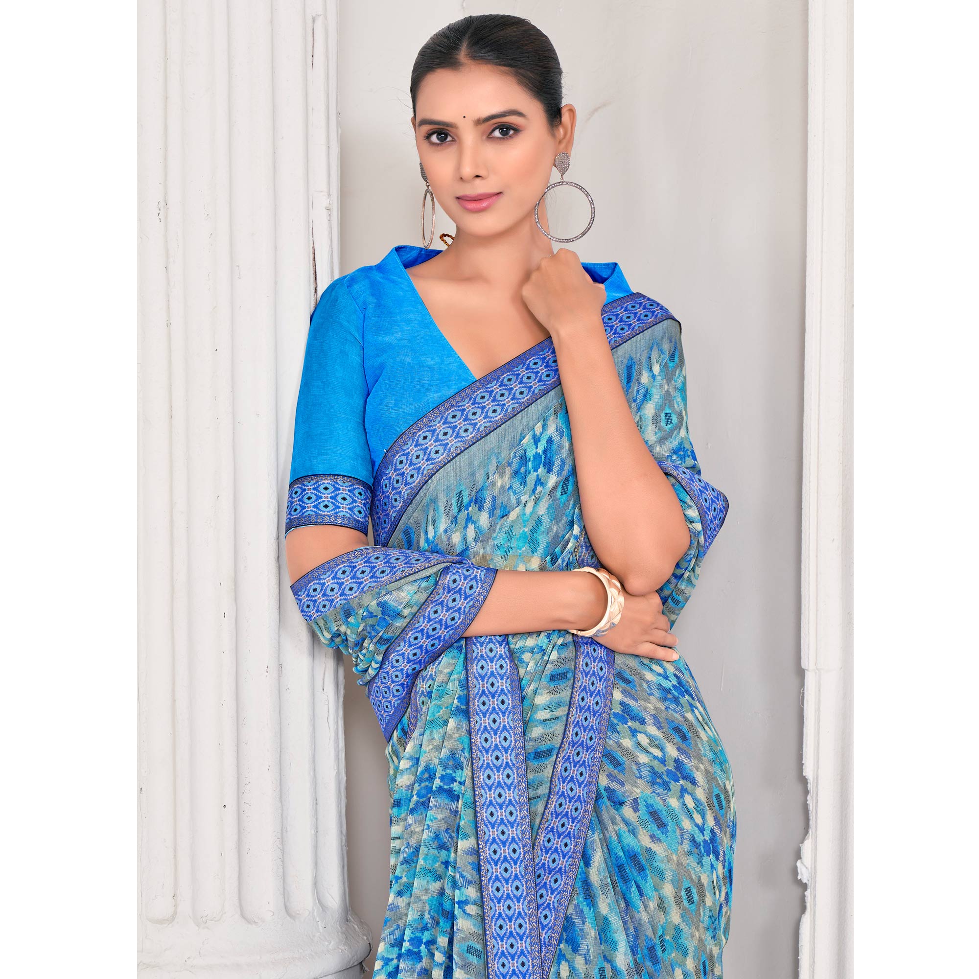 Blue Printed Chiffon Saree With Lace Border