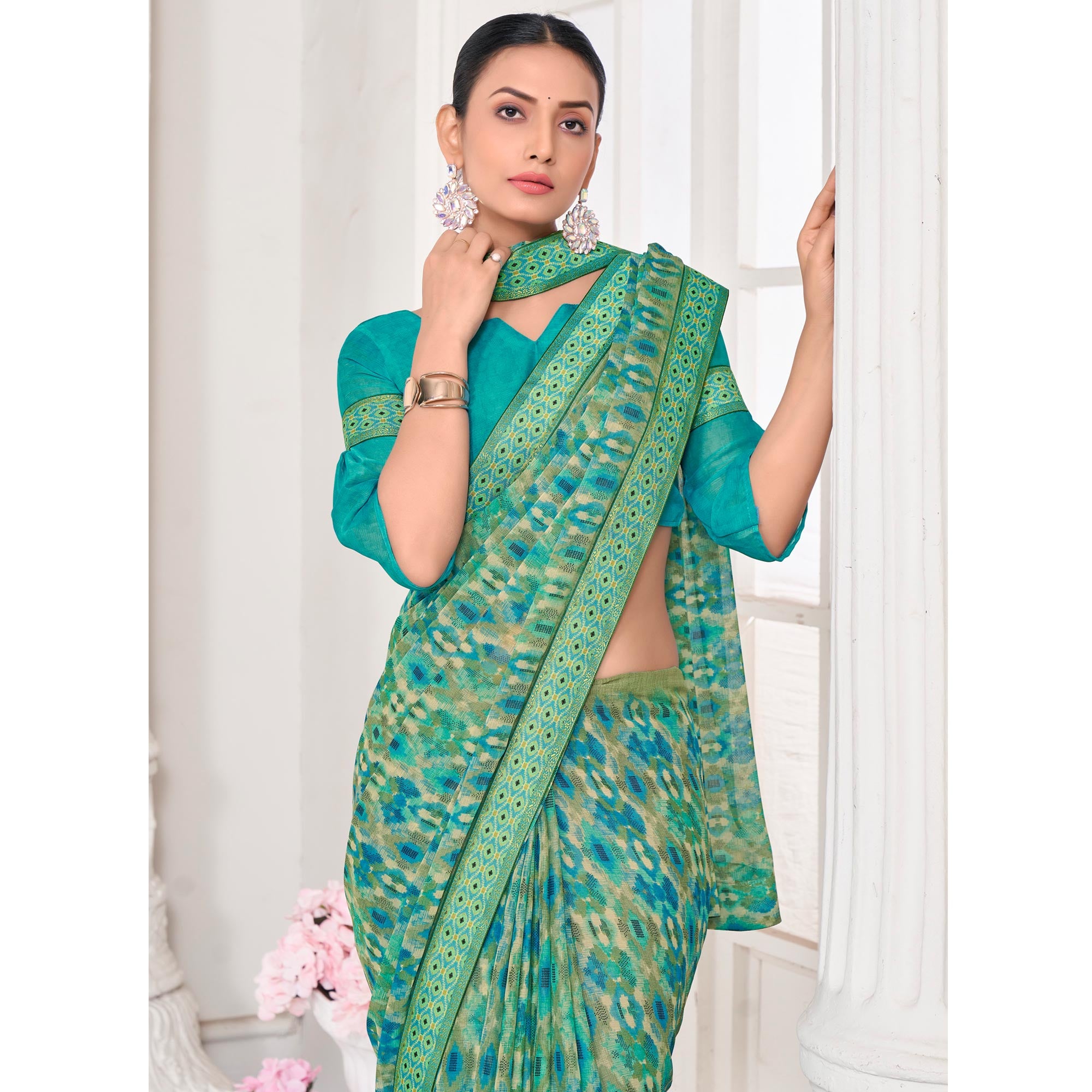 Turquoise Printed Chiffon Saree With Lace Border