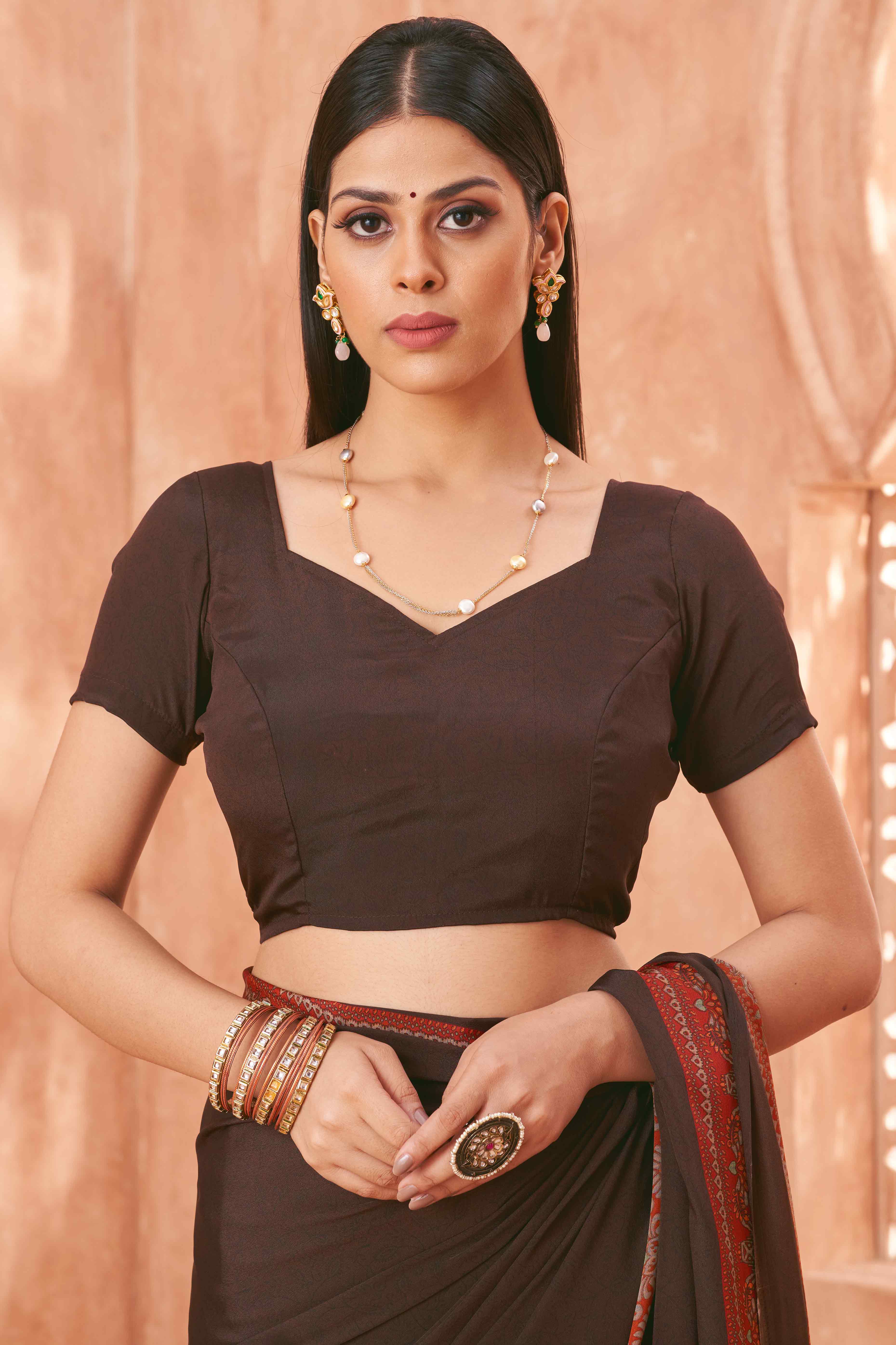 Brown Crepe Silk Saree with Elegant Floral Print Detailing