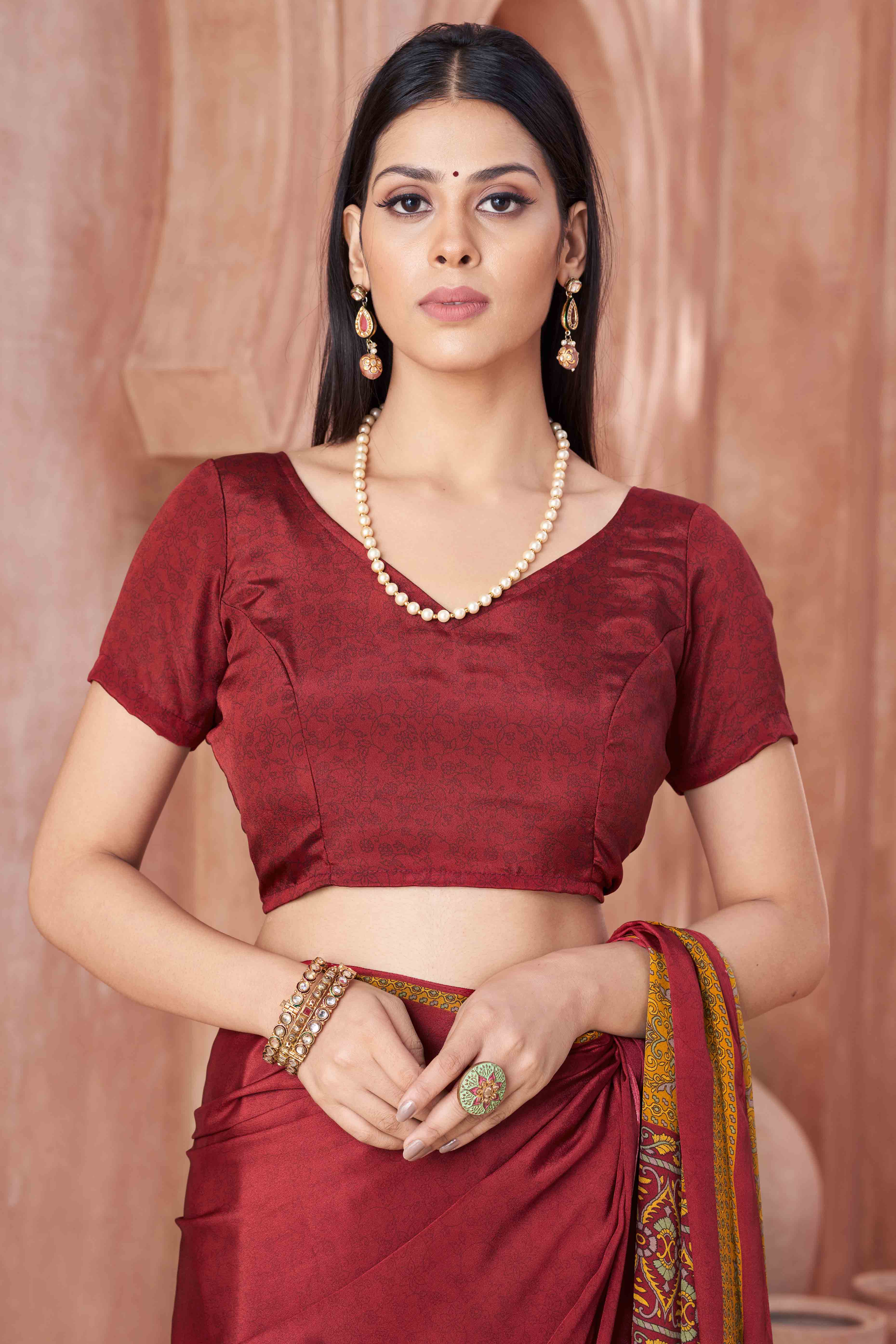 Maroon Crepe Silk Saree with Elegant Floral Print Detailing