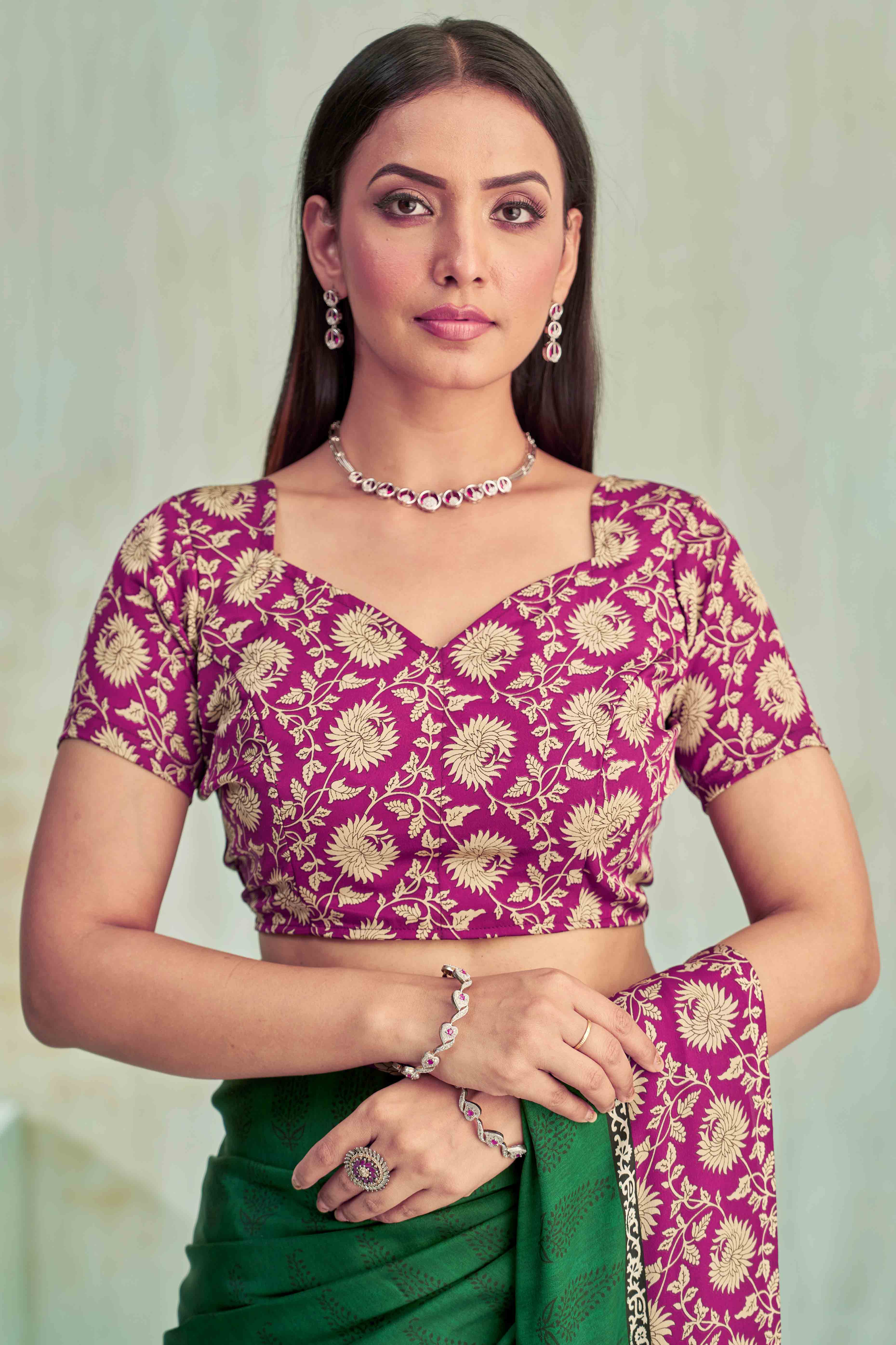 Green Crepe Silk Saree Featuring Delicate Floral Print Work