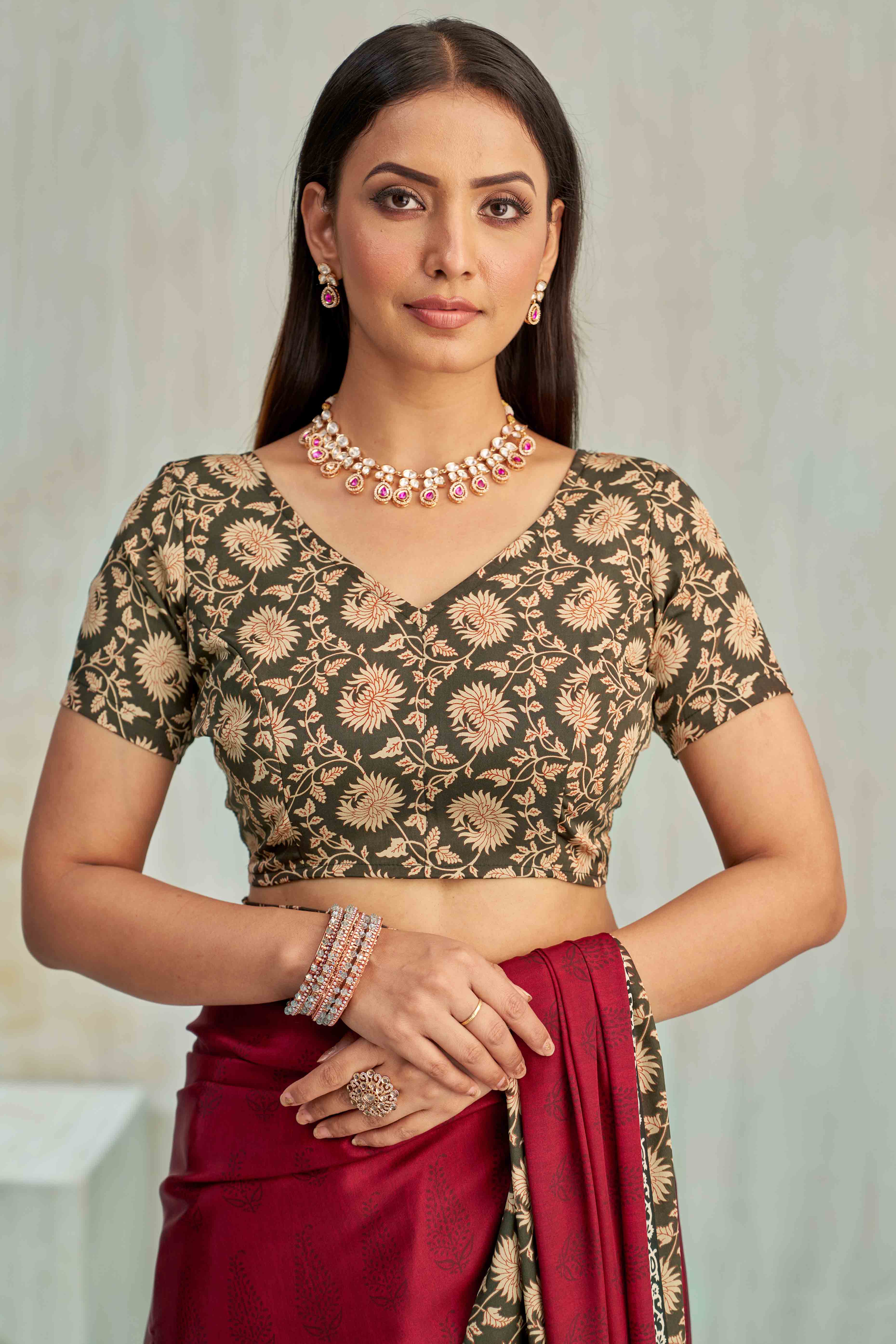 Maroon Crepe Silk Saree Featuring Delicate Floral Print Work