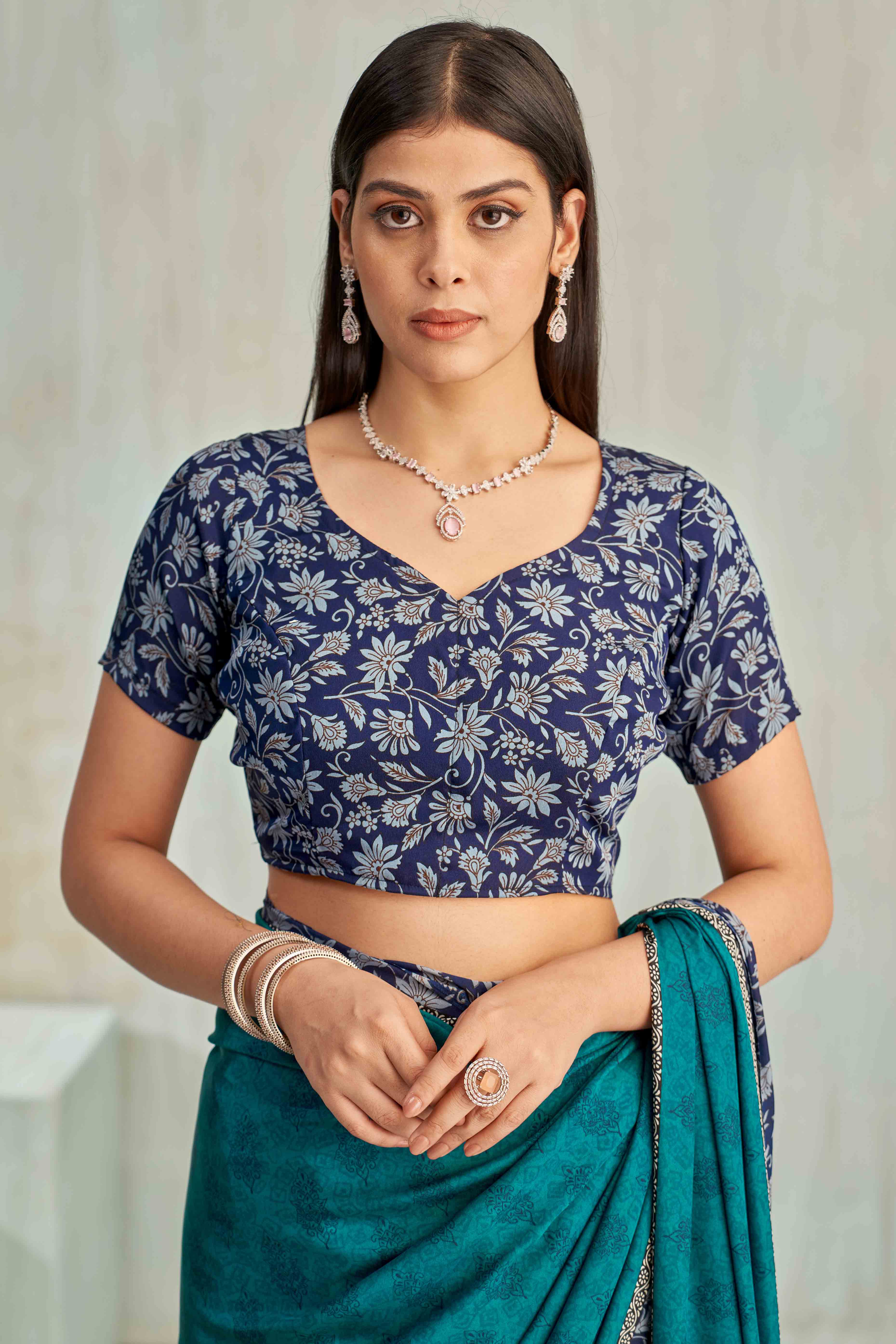 Teal Crepe Silk Saree Featuring Delicate Floral Print Work