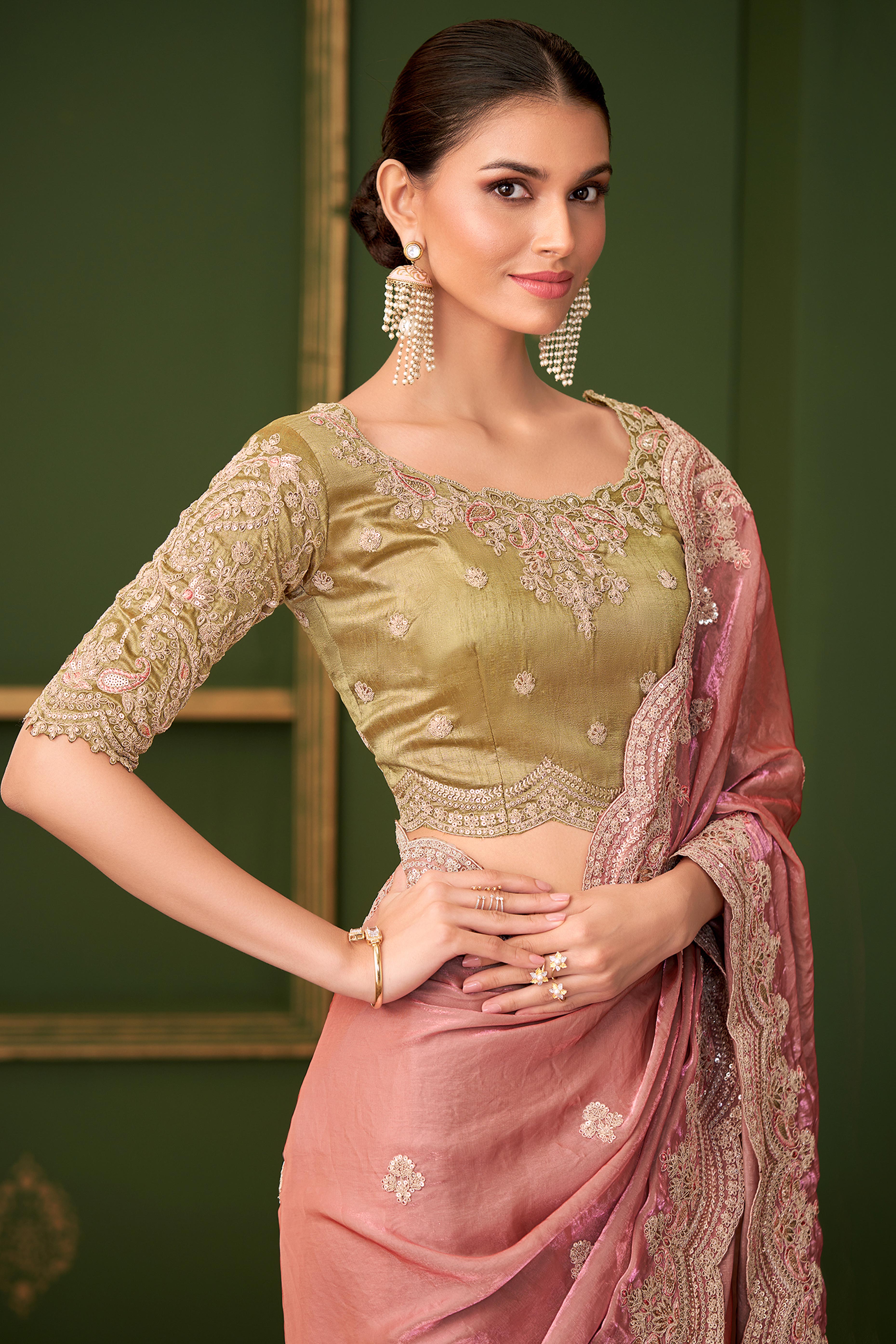 Graceful Peach Georgette Saree Adorned With Floral Cording Sequins Embroidery & Cutwork Border