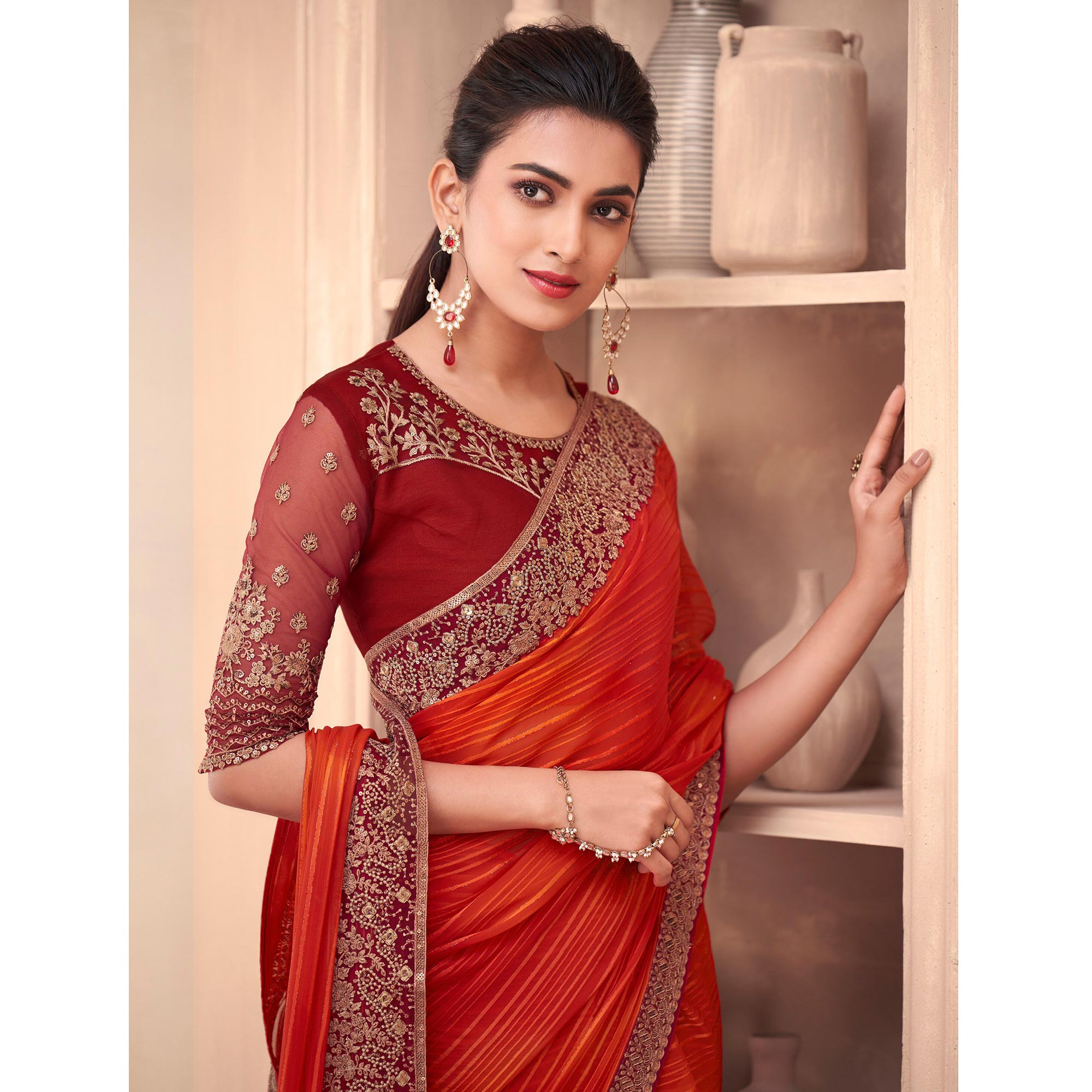 Orange Floral Embroidered Georgette Saree