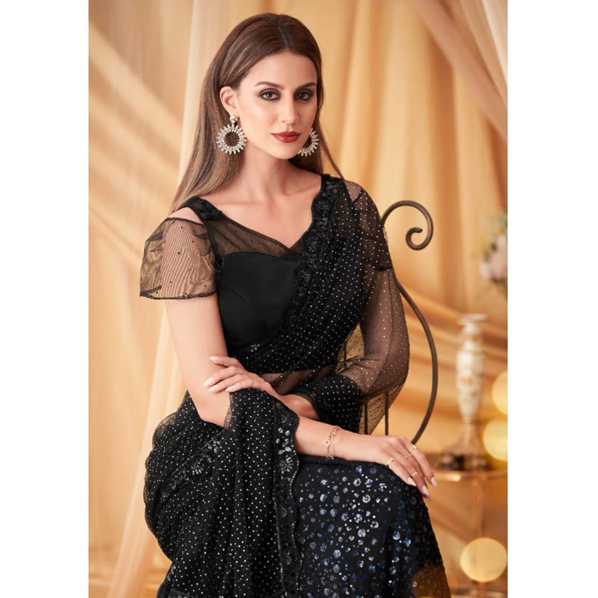 Black Sequins Embroidered Georgette Saree With Tassels