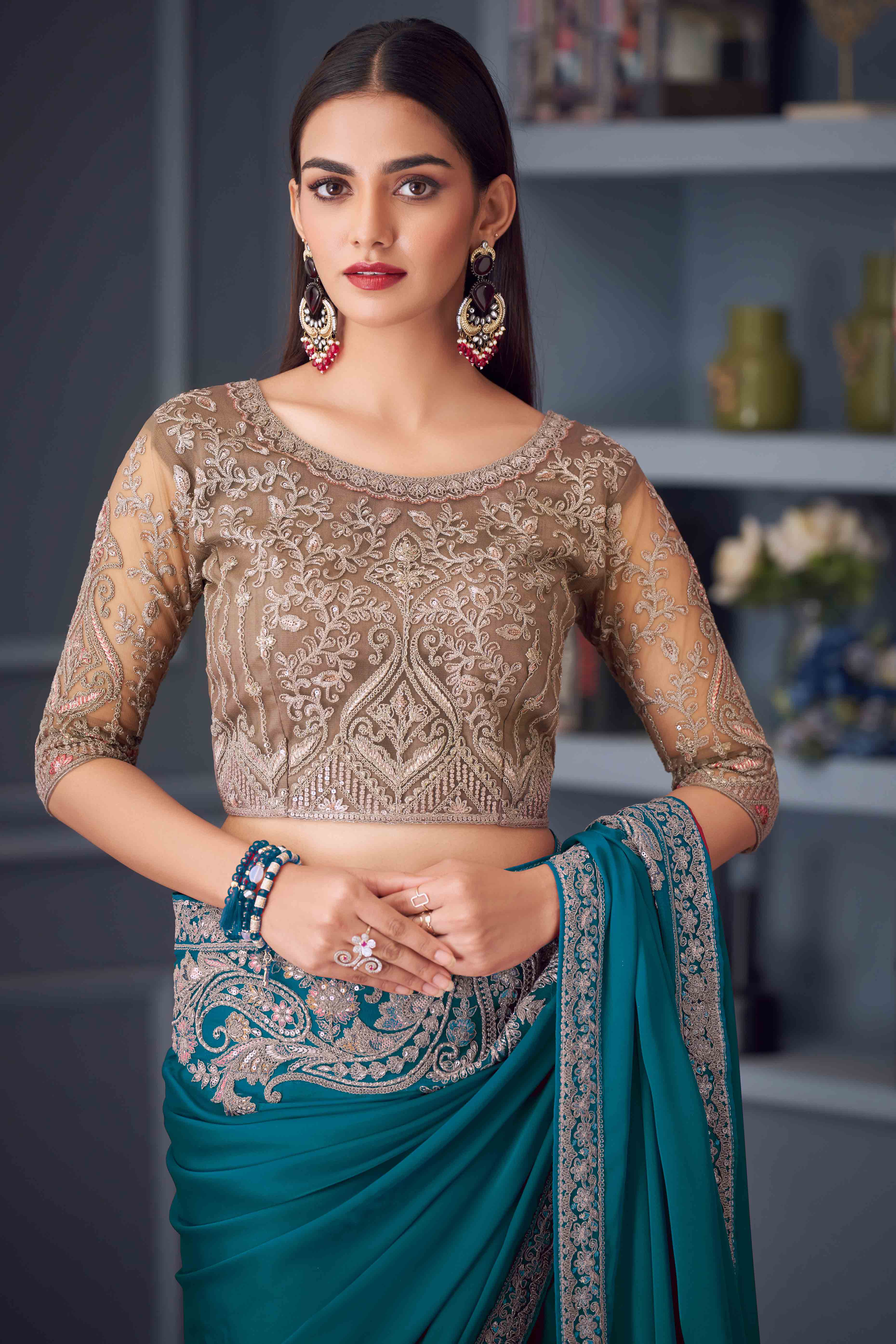 Teal Satin Saree Embellished with Sequin Work
