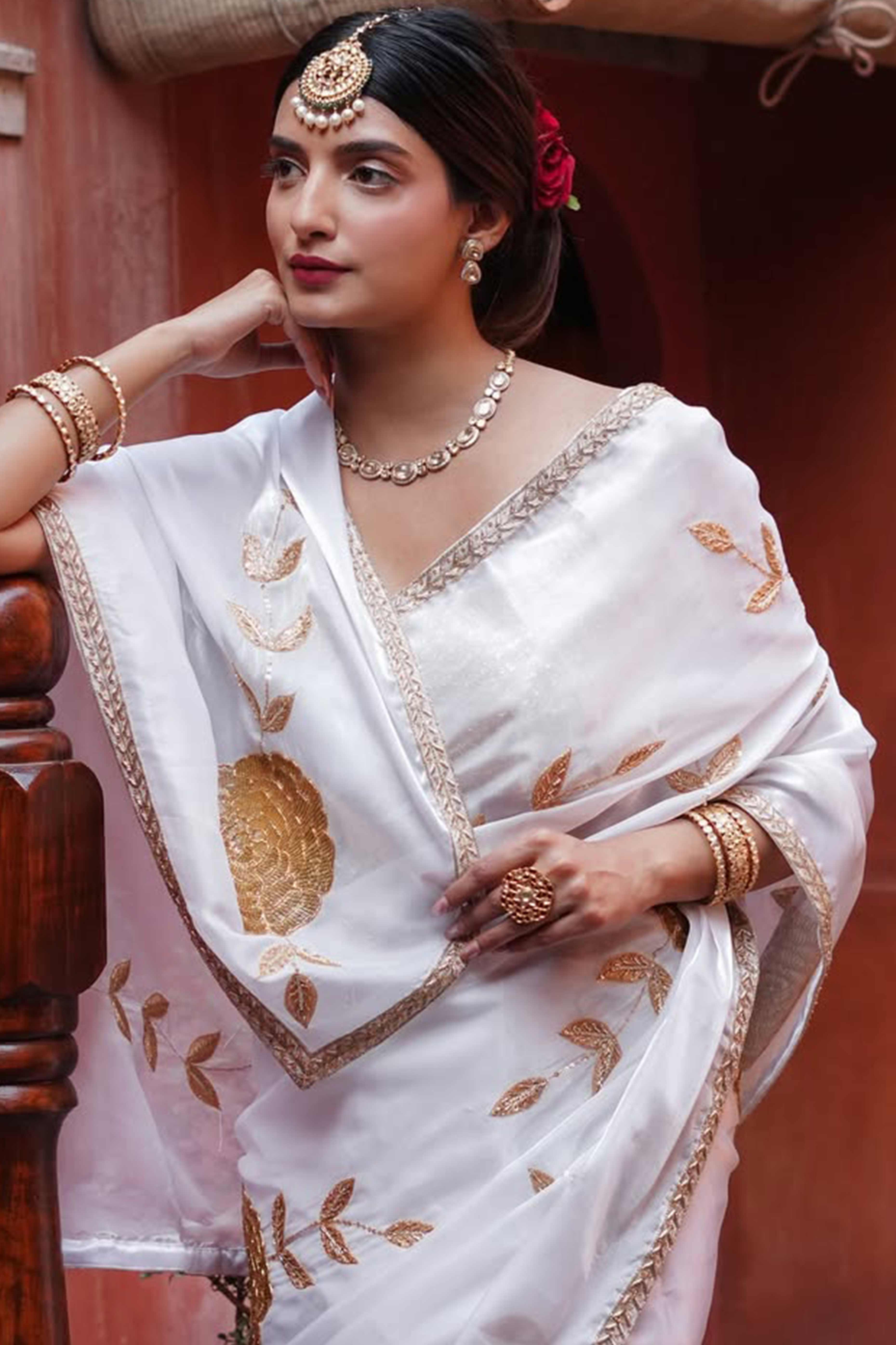 White Silk Blend Saree Featuring Delicate Floral Motifs in Shimmering Sequins