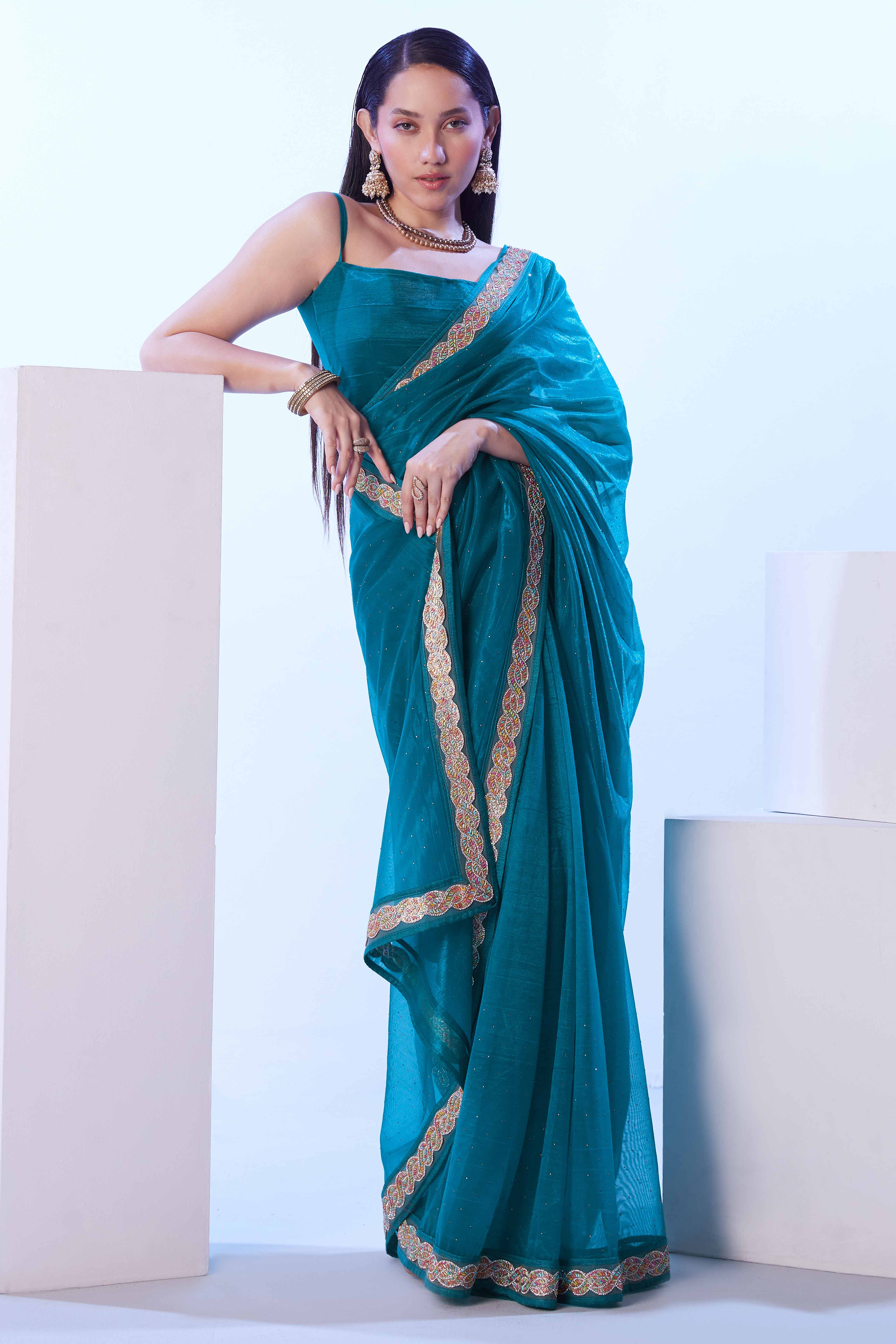 Teal Stone Work Net Solid Embroidered Saree for Party Wear