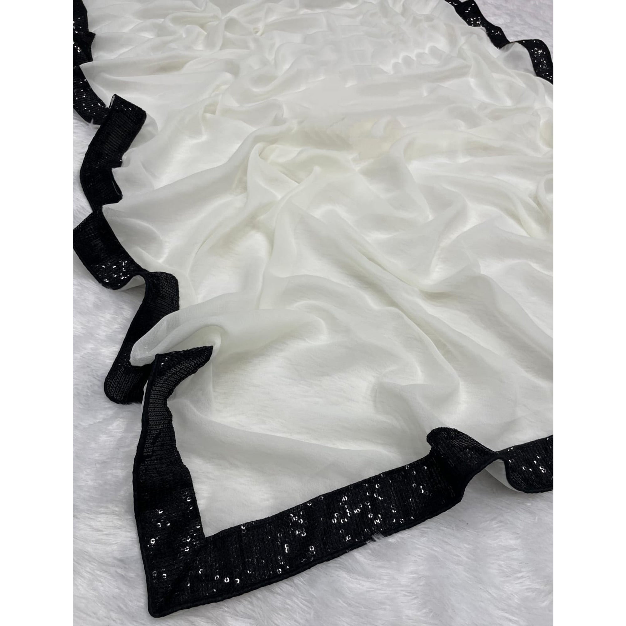 White Solid With Embroidered Border Georgette Saree