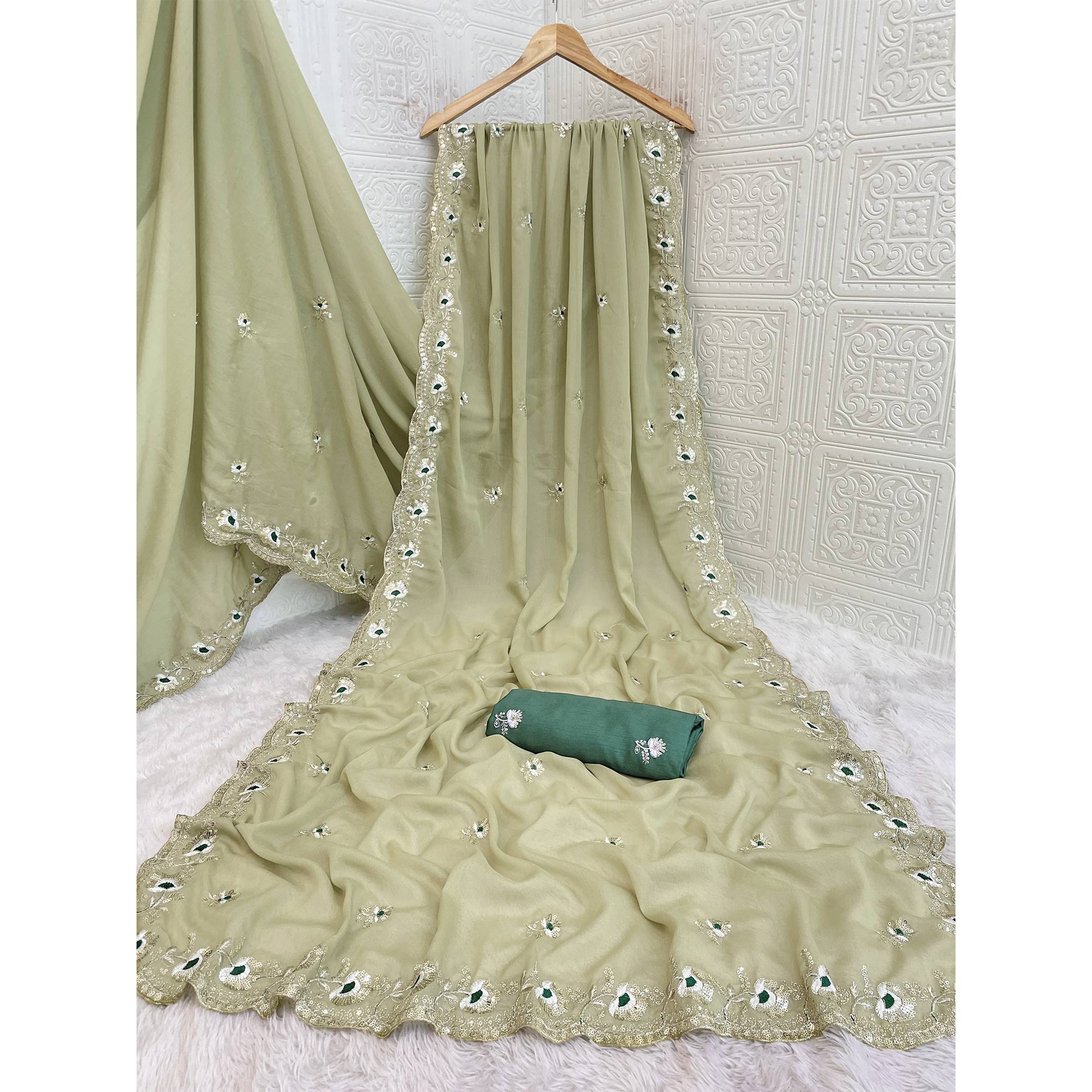 Green Georgette Silk Saree With Floral Sequin Embroidery & Graceful Cutwork Detailing Border