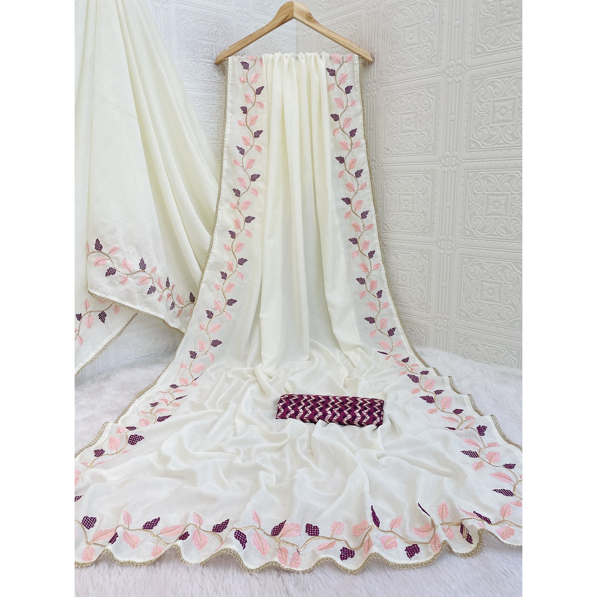 Graceful Offwhite & Wine Pure Silk Saree With Intricate Thread Embroidery And Delicate Lace Border