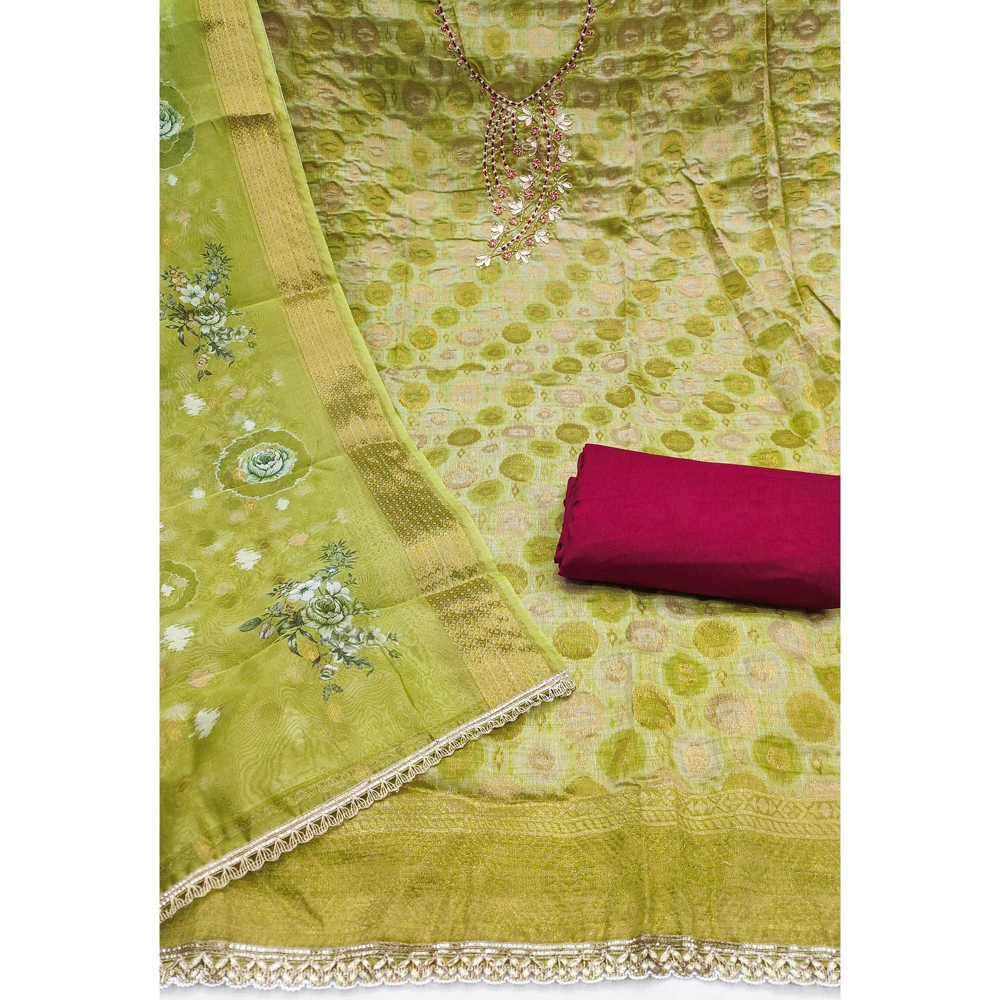Sophisticated Green Zari Woven Jacquard Dress Material Highlighted With Floral Handwork