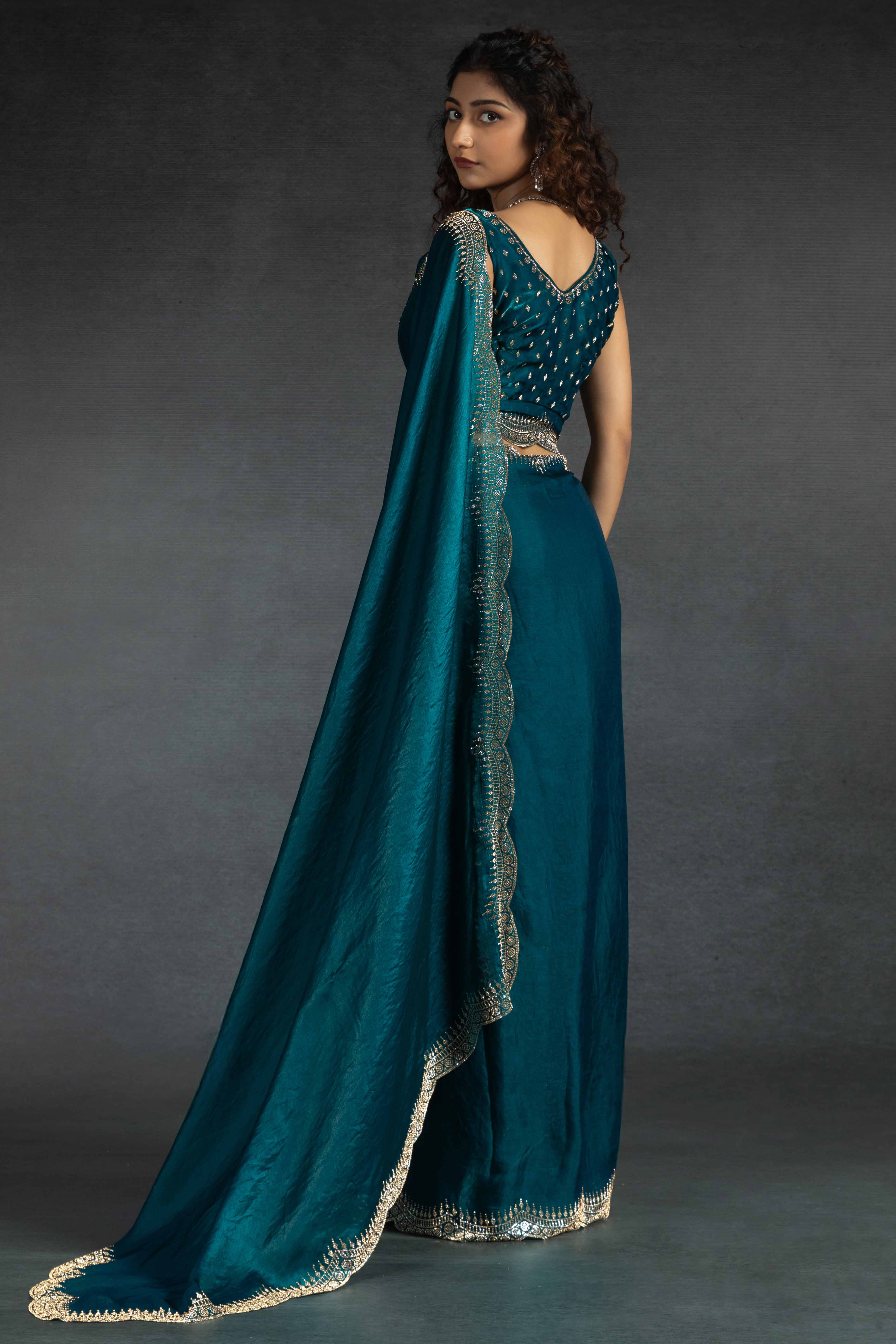 Teal Satin Saree Embellished with Stones for a Party Look