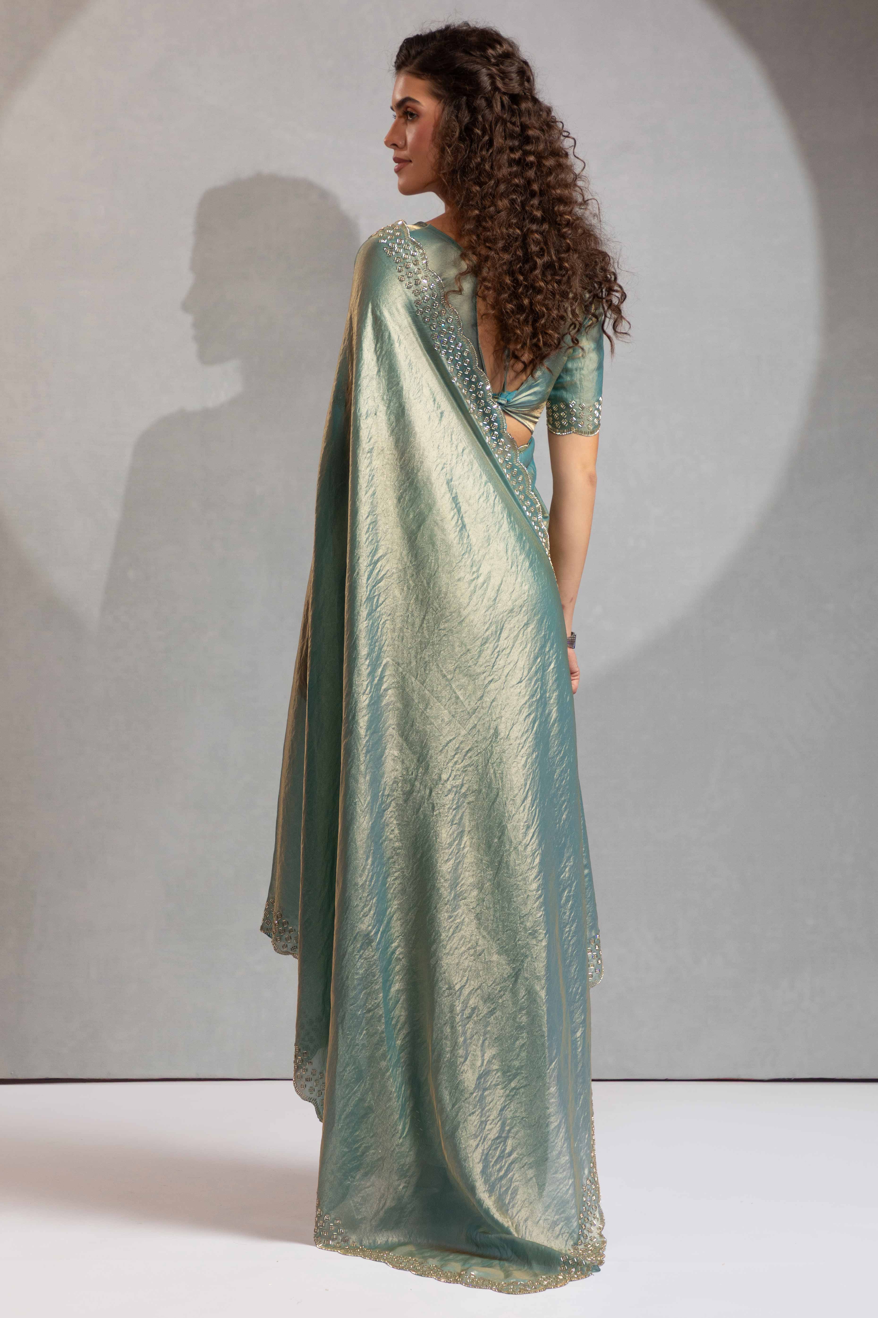 Sea Green Satin Saree with Glamorous Stone Embellishment