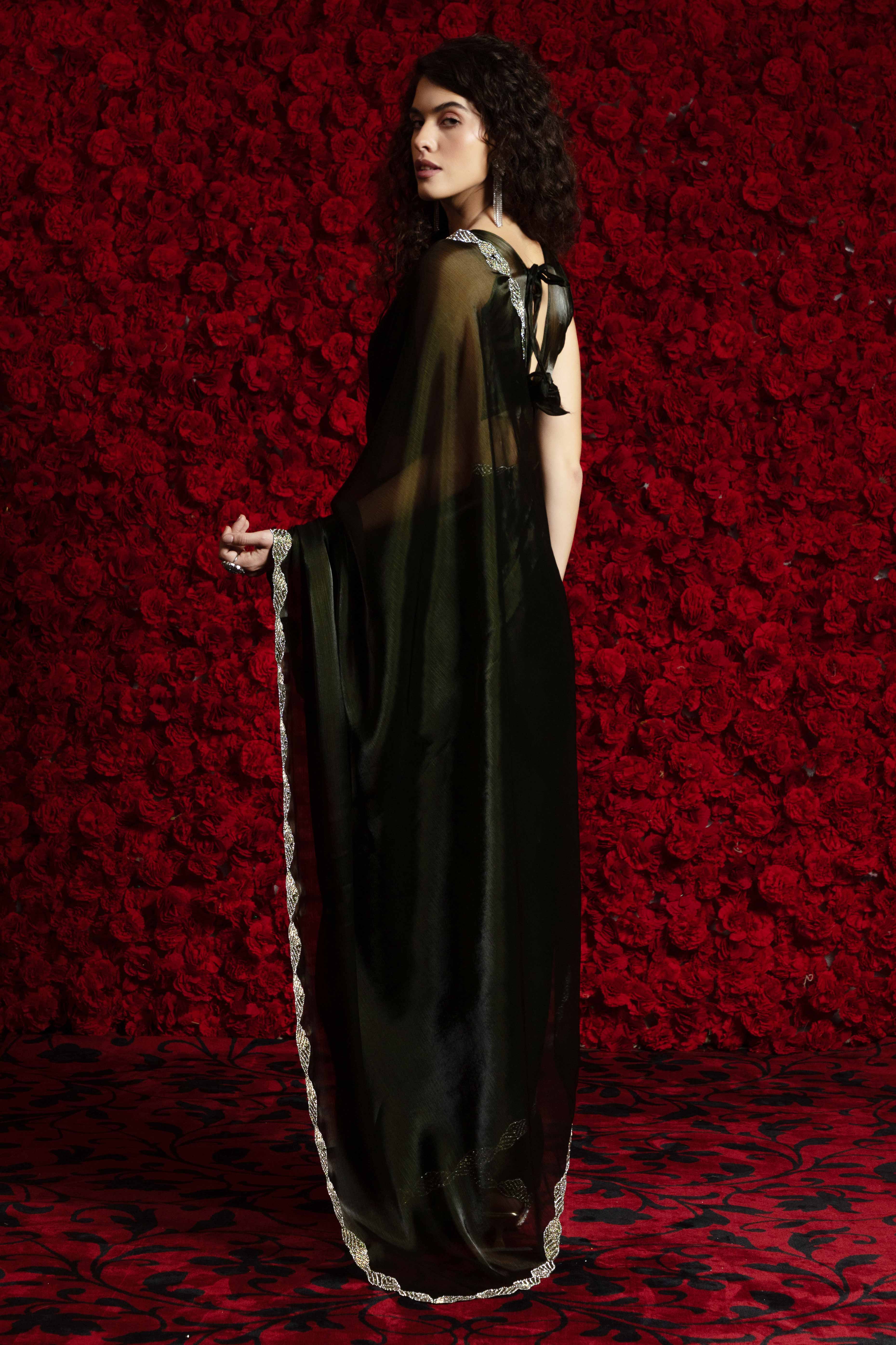 Deep Olive Solid Tissue Chiffon Saree Accentuated With A Sparkling Zarkan Work Border