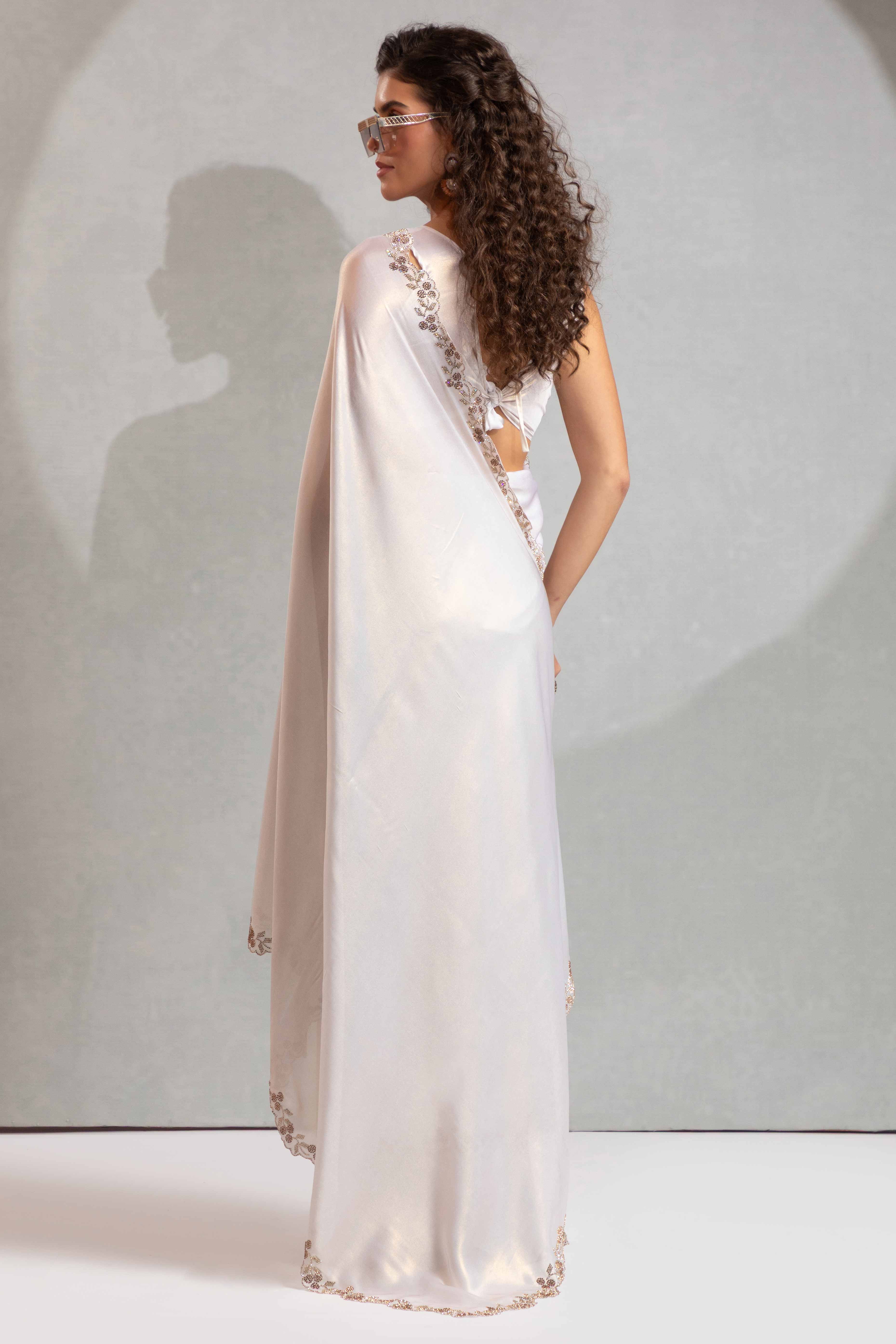 White Satin Georgette Saree Adorned With Subtle Foil Finish & A Sparkling Zarkan Work Border