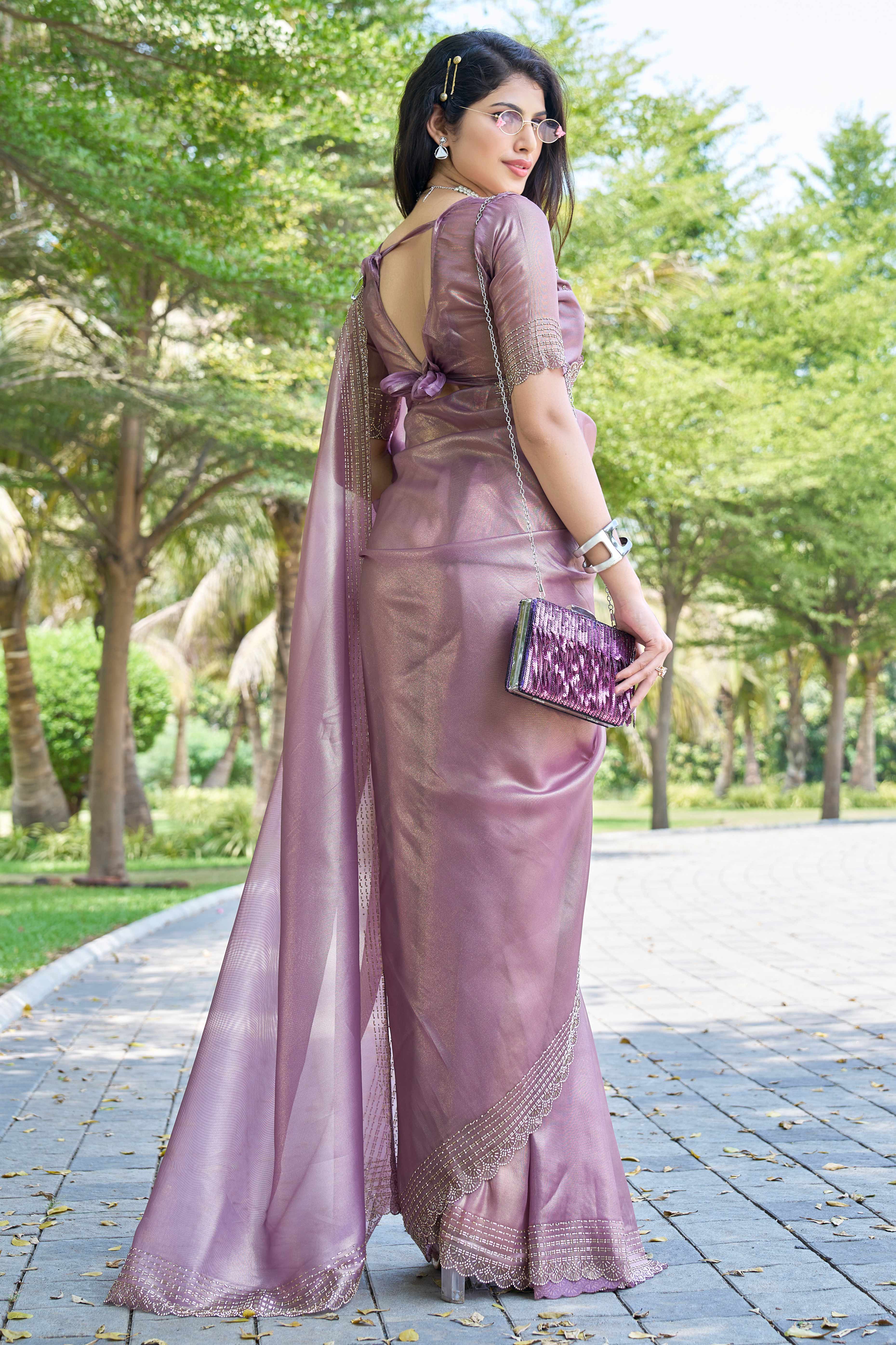 Pastel Purple Soft Organza Saree with Stone Embellishments Work