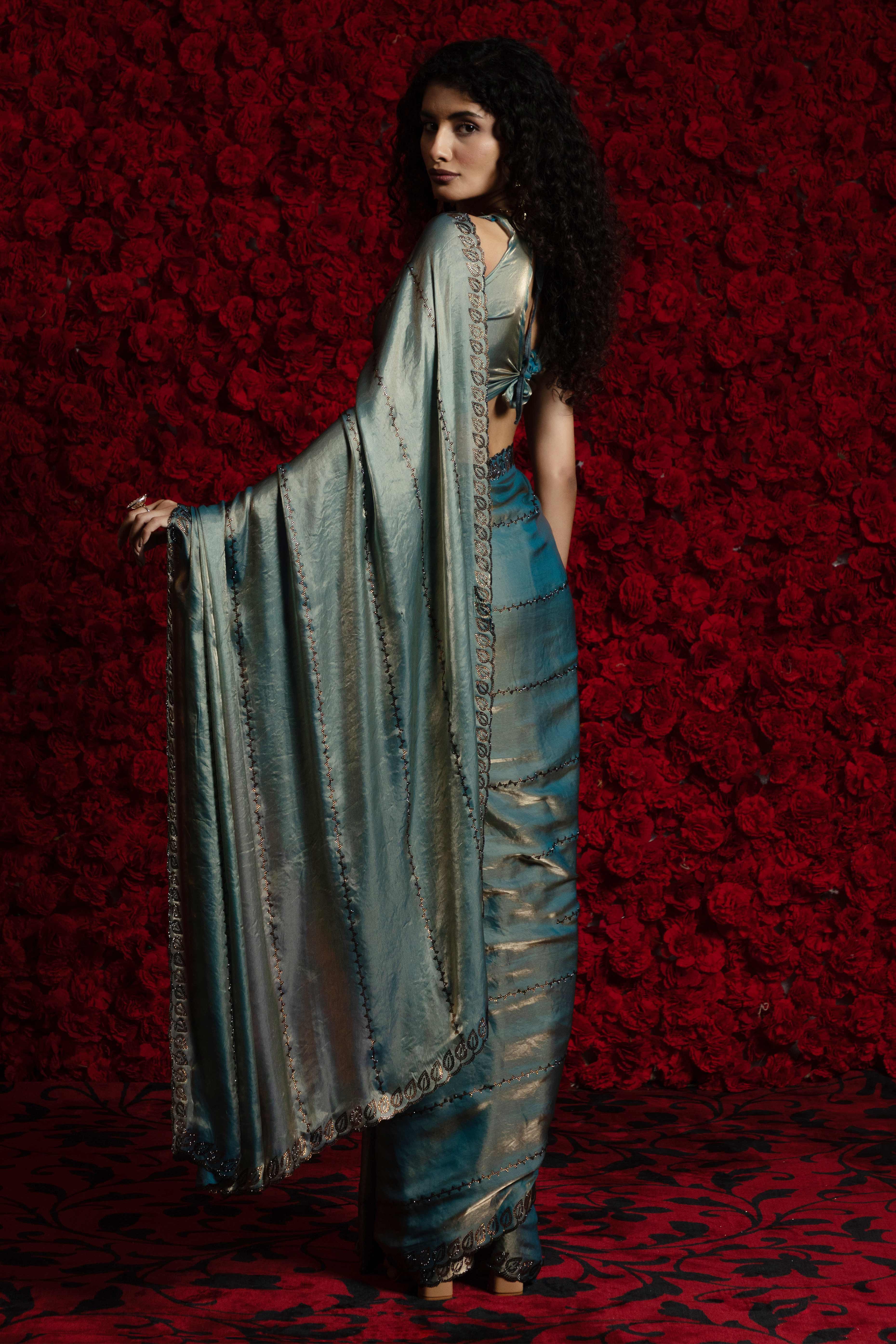 Teal Satin Silk Saree with Dazzling Stone Embellishments for Special Occasions