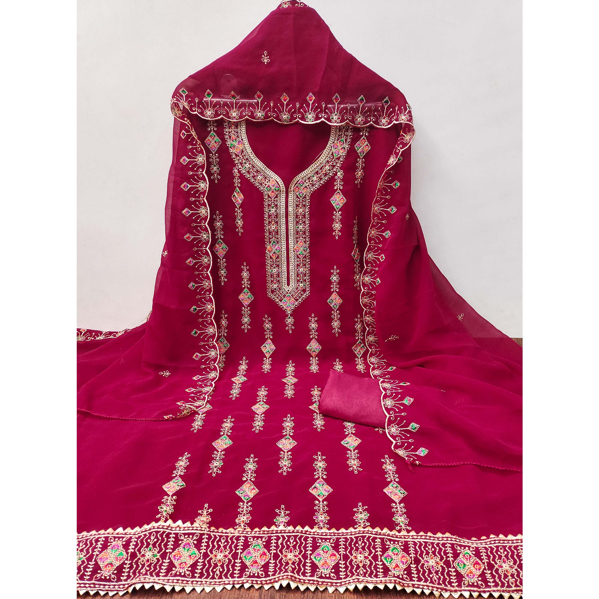 Pink Georgette Dress Material Enhanced With Graceful Floral Embroidery For An Elegant Ethnic Look