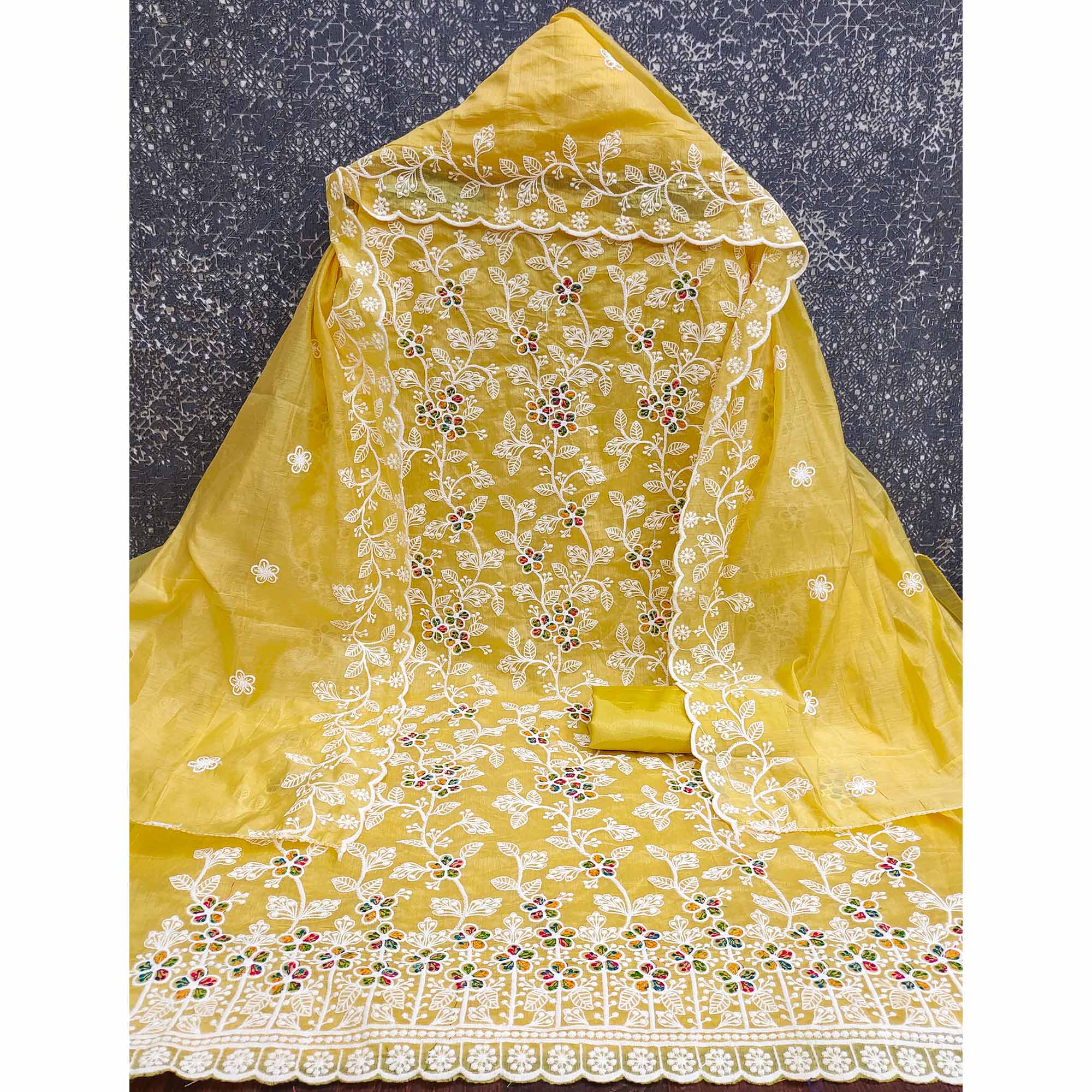 Yellow Chanderi Cotton Dress Material Adorned With Elegant Floral Thread Embroidery Work