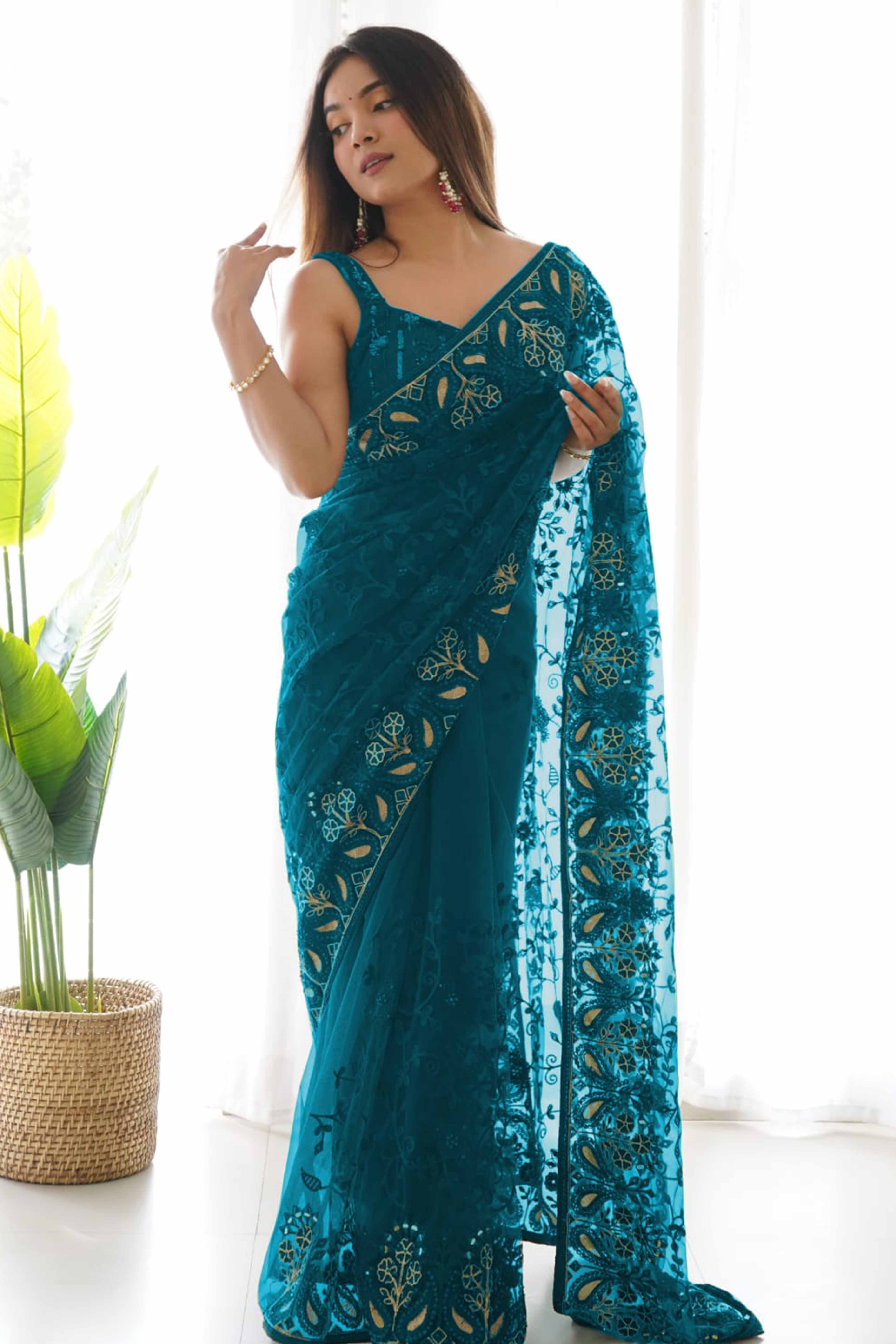 Teal Net Saree With Floral Thread Embroidery Adorned In Stone & Mirror Accents