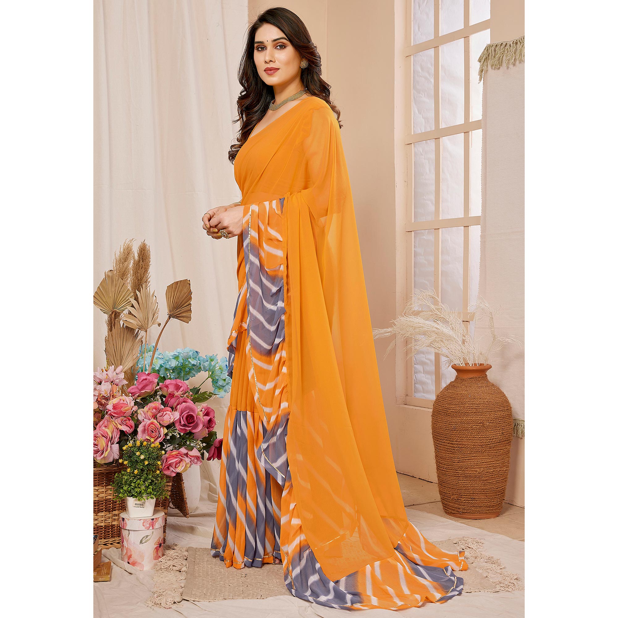 Orange Solid Georgette Saree With Printed Ruffle Border