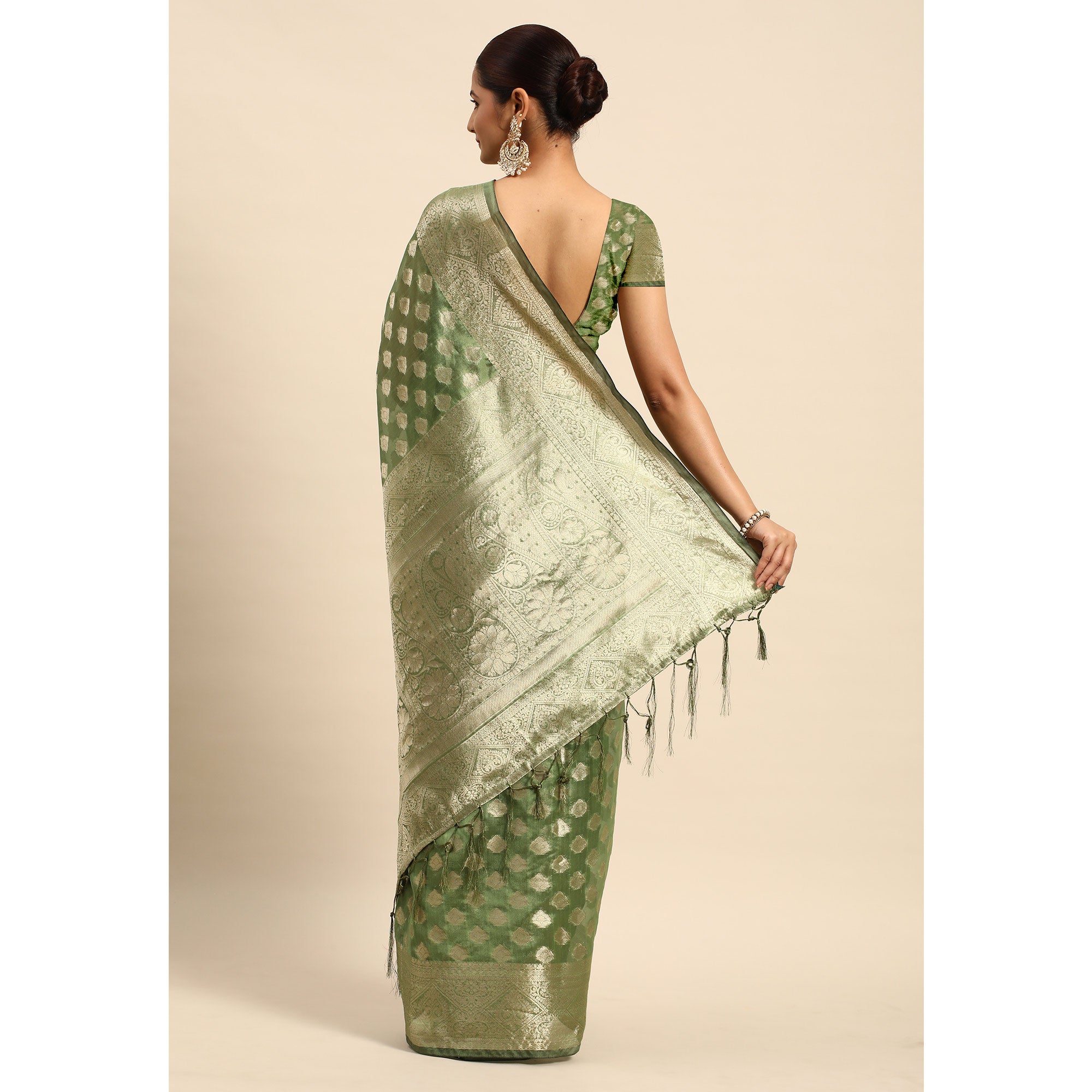 Green Woven Organza Silk Saree With Tassels