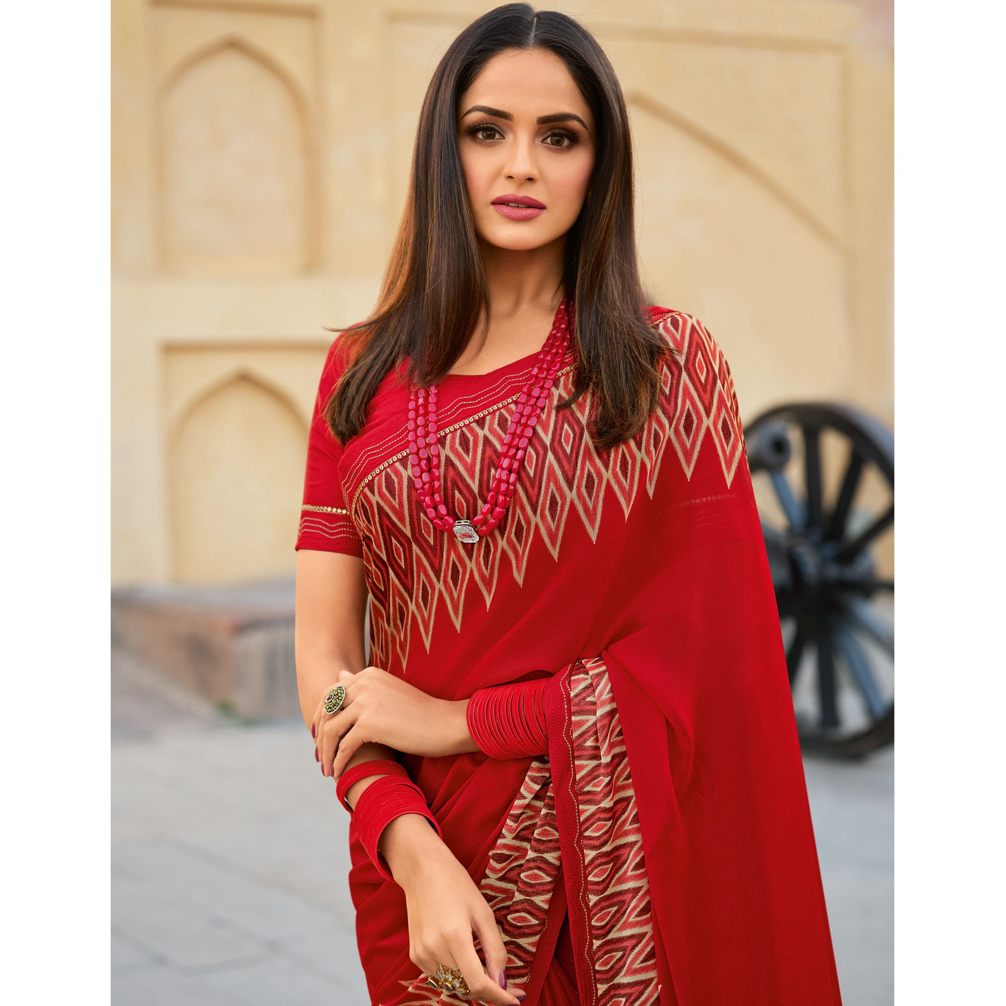 Red Printed With Embroidered Border Georgette Saree